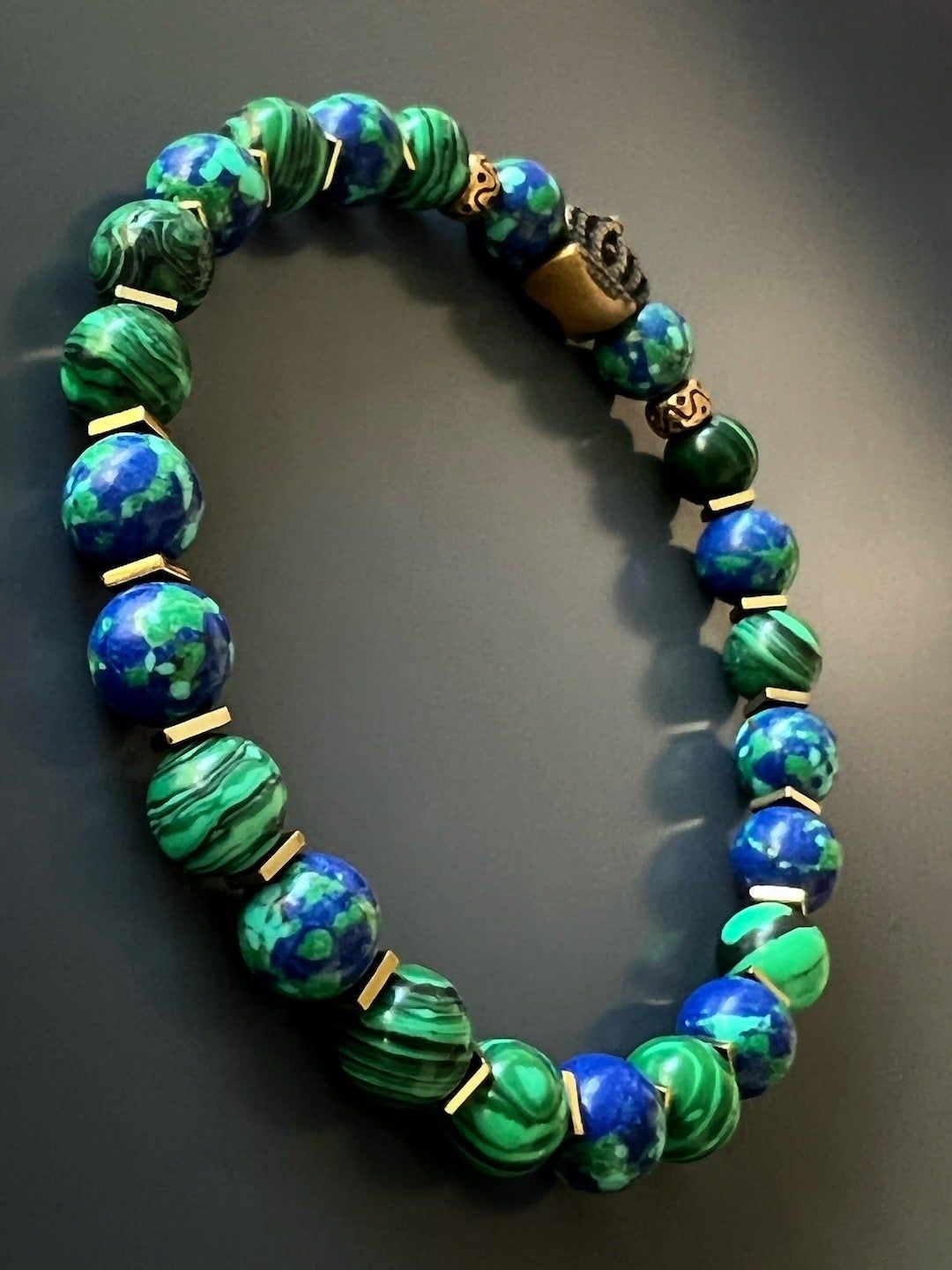 Bracelet size: 7 1/2" on stretchy jewelry cord for a comfortable fit