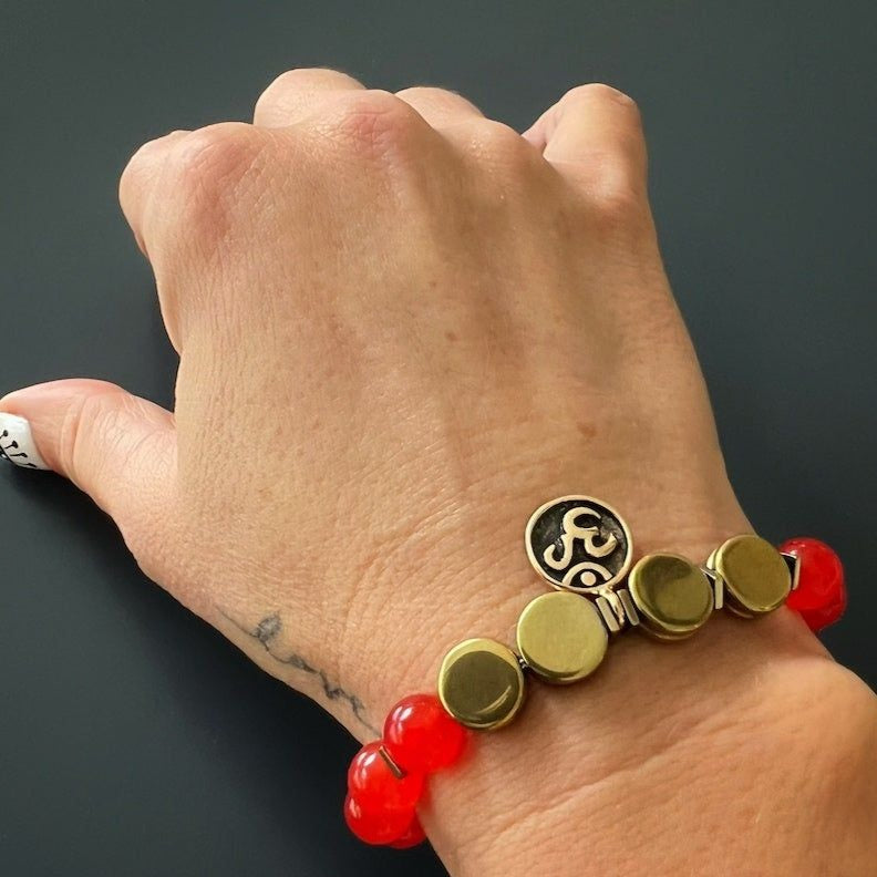 Hand model wearing the Carnelian Yoga Bracelet