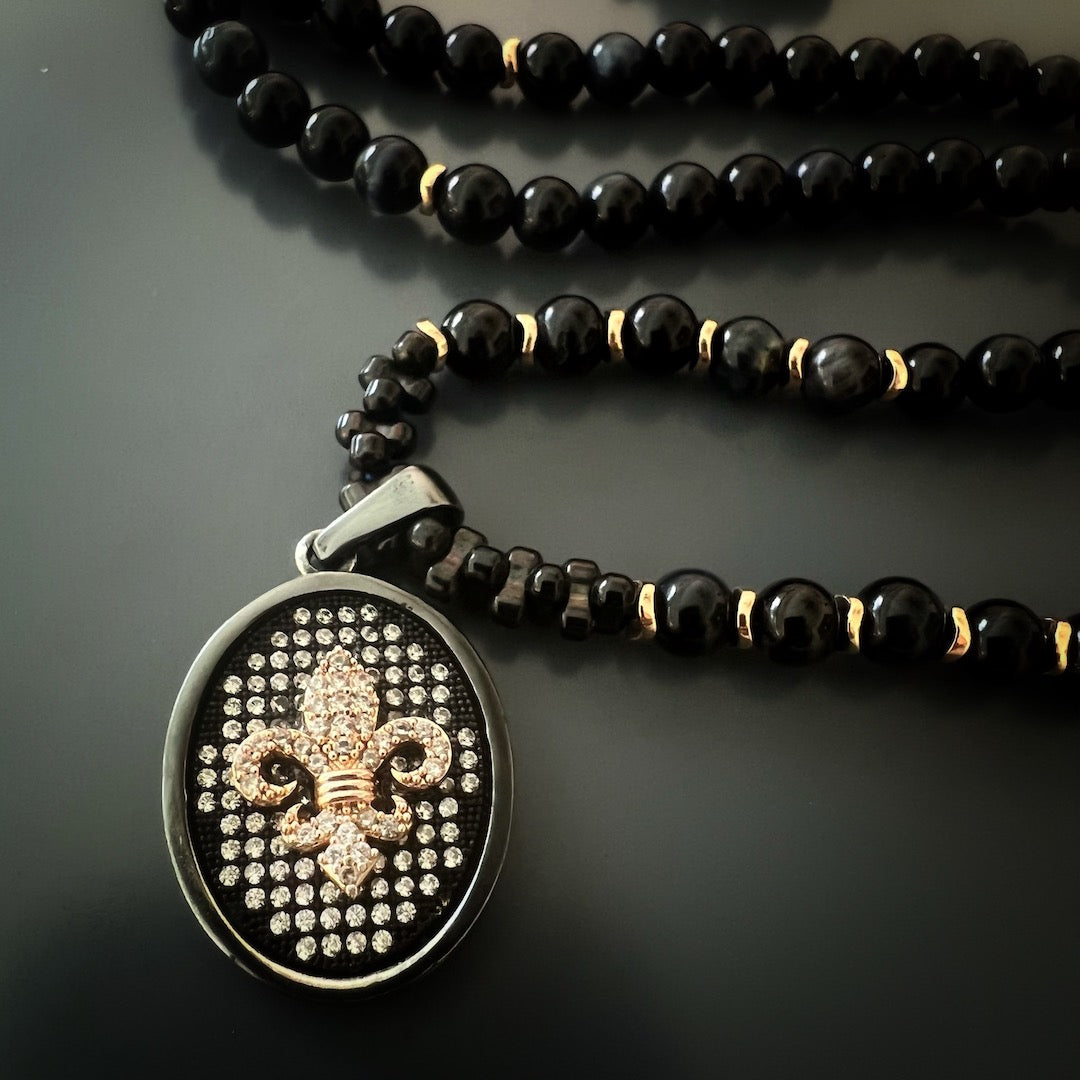 Stylish and unisex Diamond Fleur de Lis Necklace, perfect for those who seek courage, honor, and a touch of elegance in their accessories.