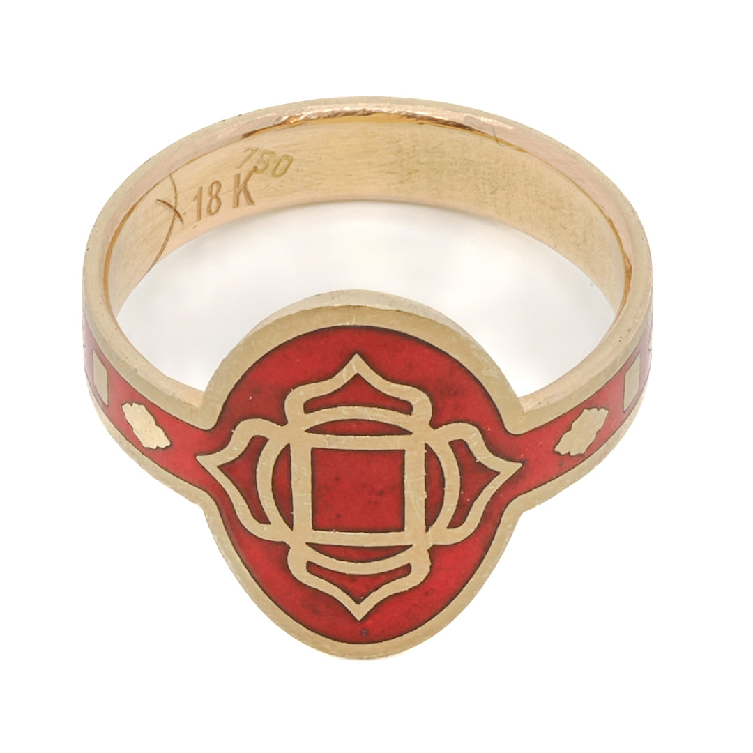 the Enamel Chakra Ring - This exquisite ring features a recycled gold band and vibrant red enamel, adding a touch of elegance and spirituality to any outfit.