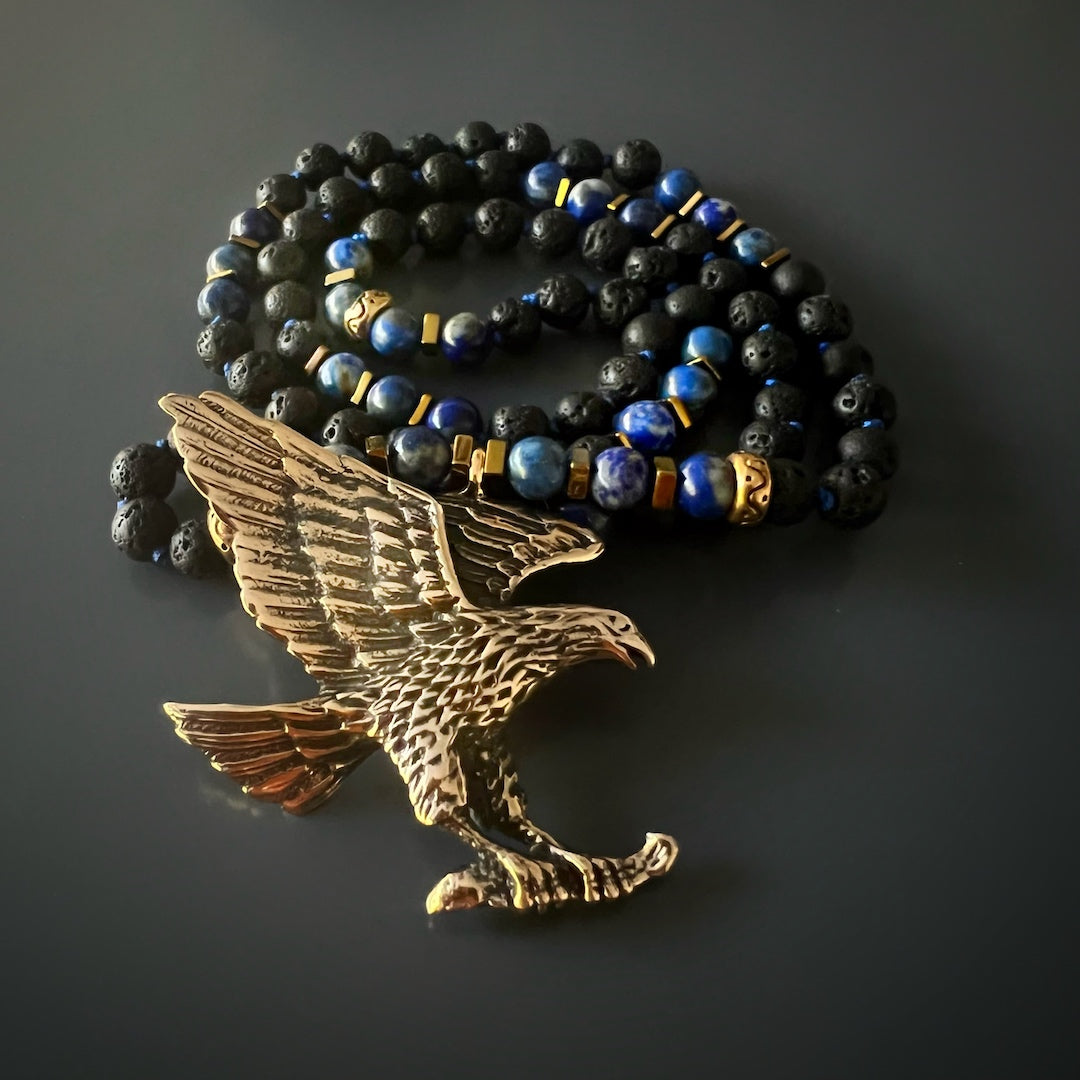 Handmade Eagle Spirit Necklace with Lava Rock and Lapis Lazuli beads, representing freedom and grounding energy.