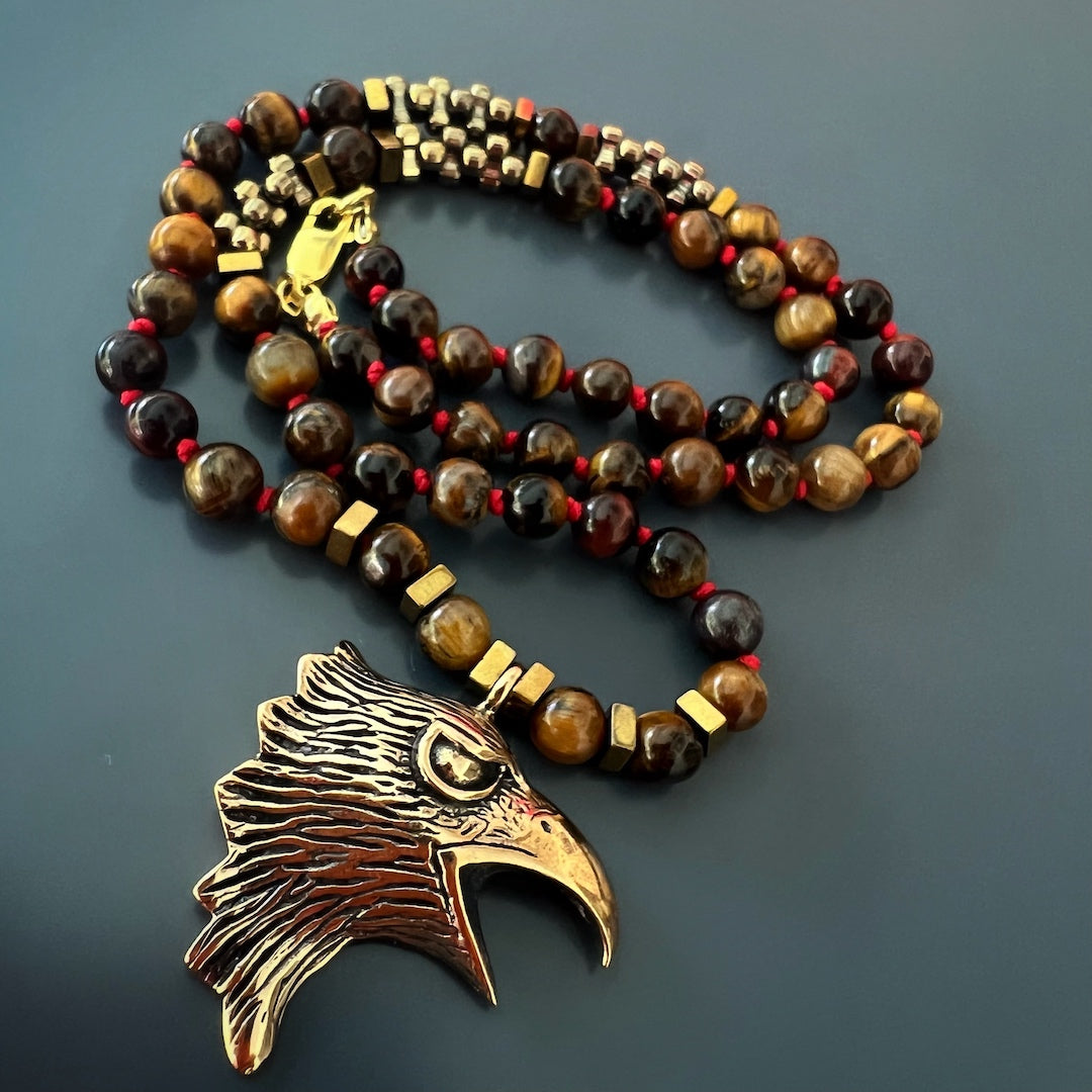 Tiger's Eye Beaded Necklace with Bronze Eagle Charm, a symbol of strength and protection.