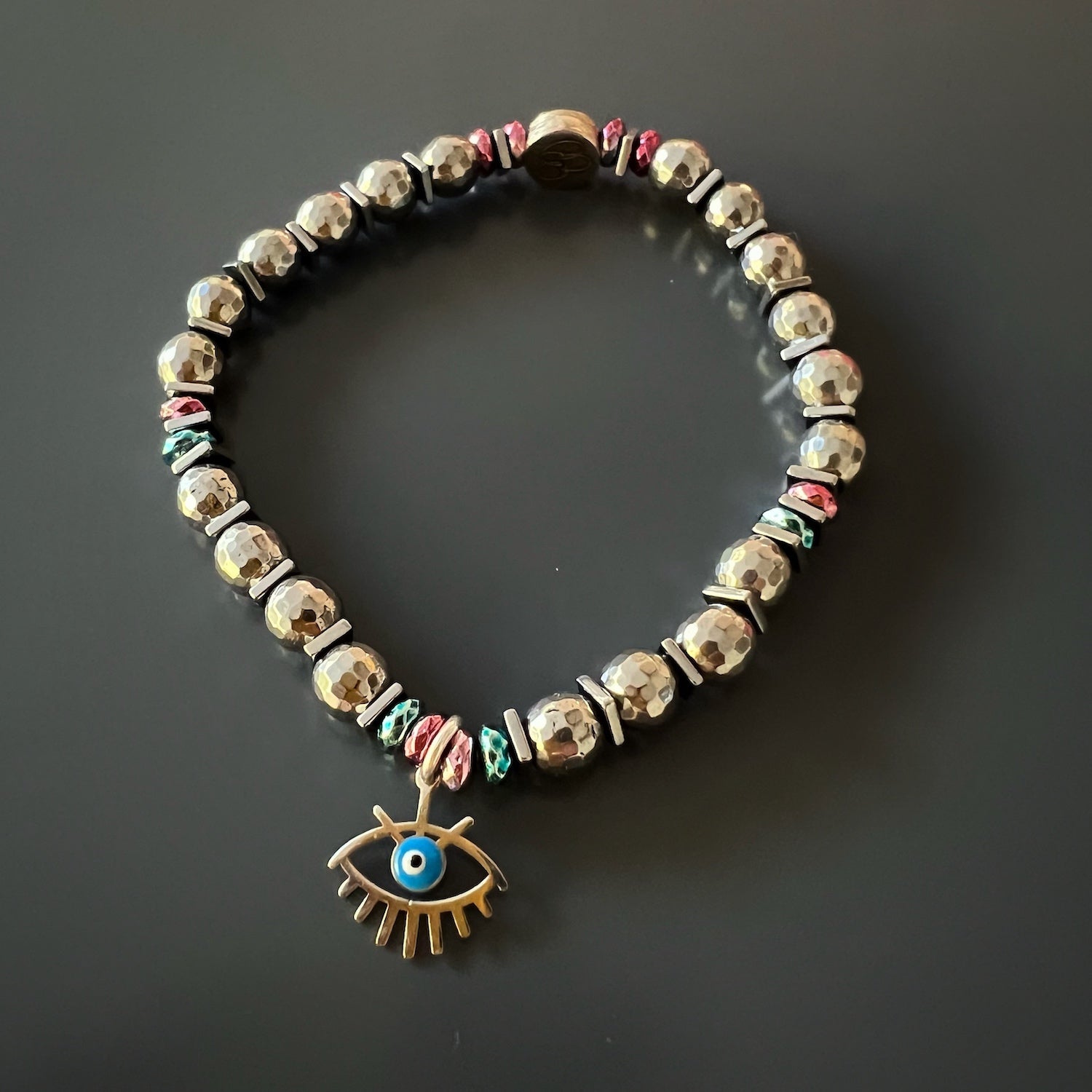 Discover the stylish and protective Eye Protection Hematite Bracelet Set, adorned with pink and blue color hematite stone spacers.