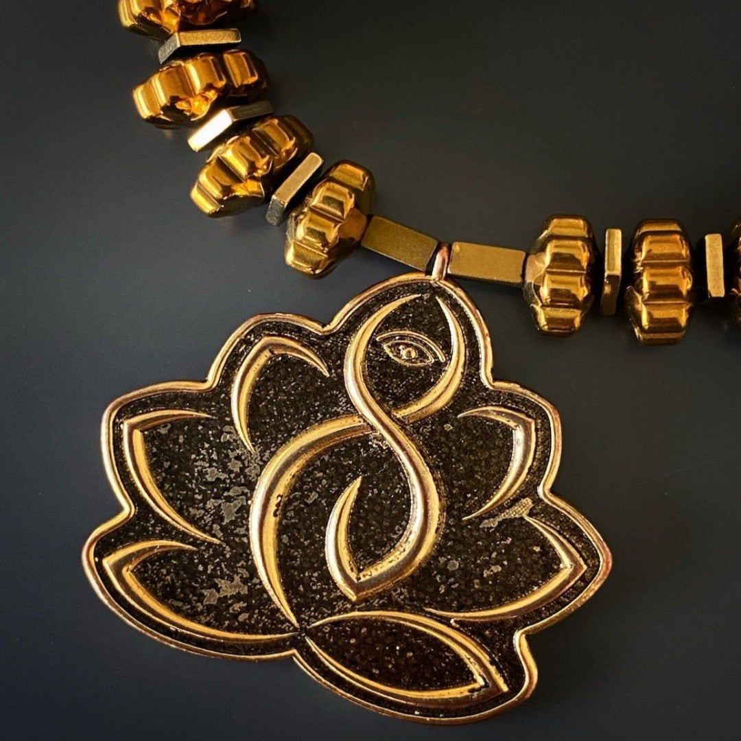 Stylish Flower Of Life Bracelet - Meticulously handcrafted with gold color nugget hematite beads, Lotus Flower charm, and Buddha quote message charm, symbolizing purity, enlightenment, and self-control
