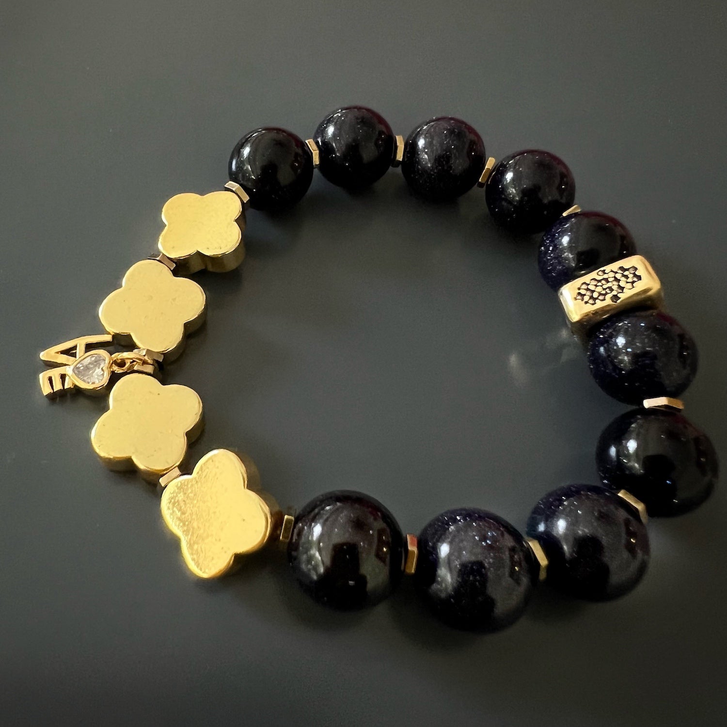 Alhambra Love Bracelet - Handmade jewelry piece featuring a gold plated love charm adorned with a simulated diamond, inspired by the beauty of the Alhambra.