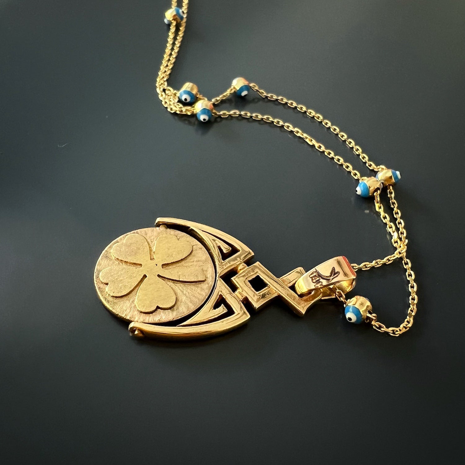 Gold and Diamond Evil Eye Pendant Necklace - Handmade from 14k yellow gold, this necklace features a captivating Evil Eye pendant adorned with diamonds and vibrant blue and yellow enamel, adding a touch of elegance and symbolism to any outfit.