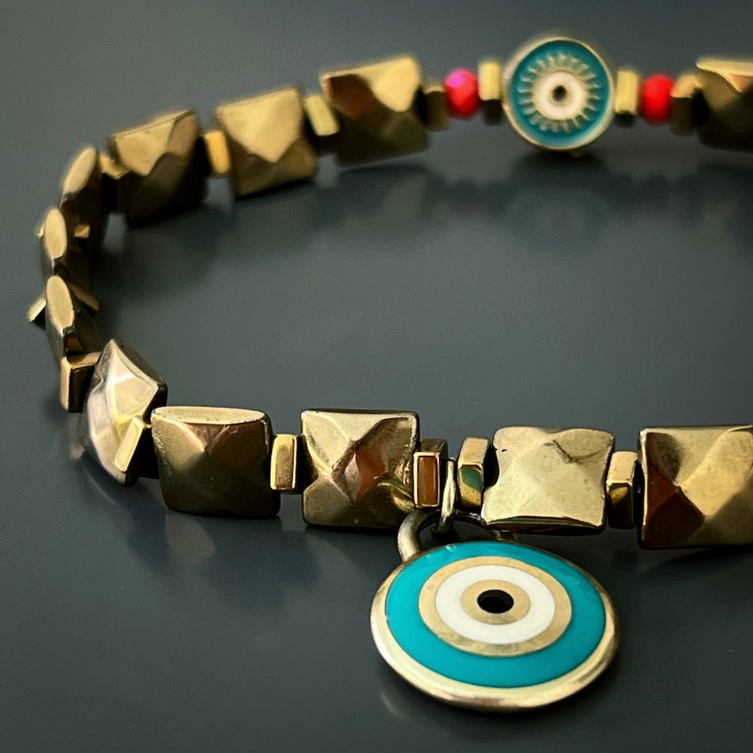 Sterling silver on gold plated evil eye anklet with faceted hematite stones