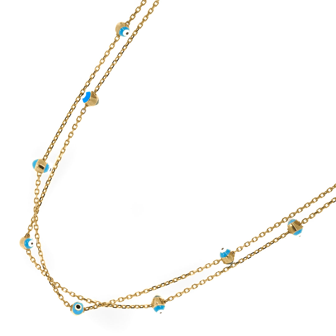 Stylish Evil Eye Pendant Necklace - A captivating image of the Gold Evil Eye Triple Necklace.