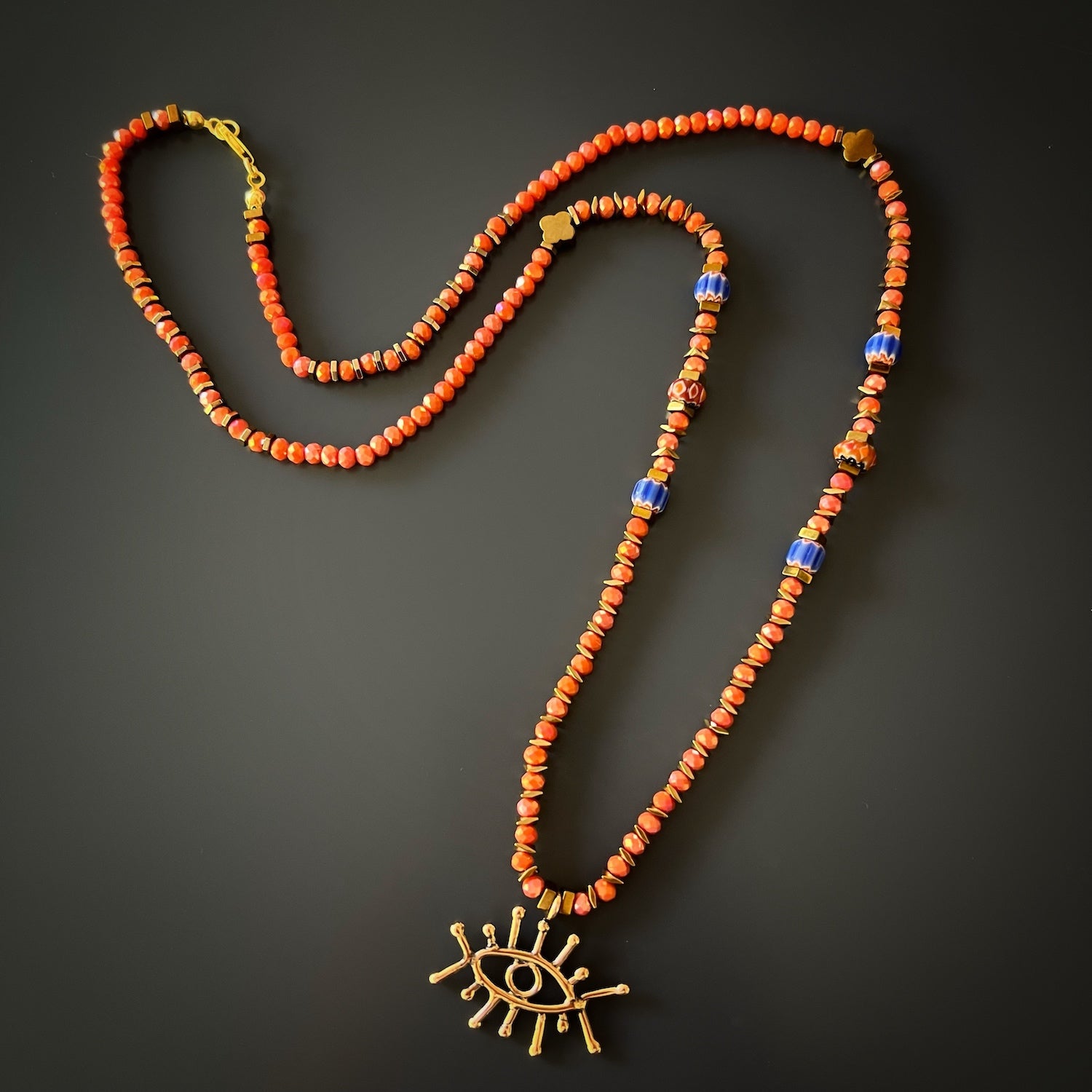 Good Vibes Eye Necklace showcasing a variety of beads and a striking evil eye pendant