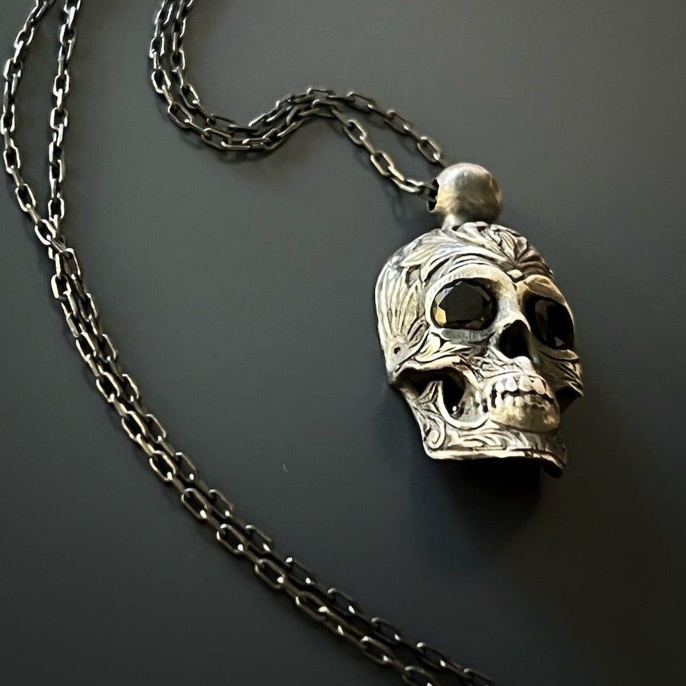 Gothic Silver Skull Necklace with a sterling silver skull pendant and intricate Swarovski crystal details