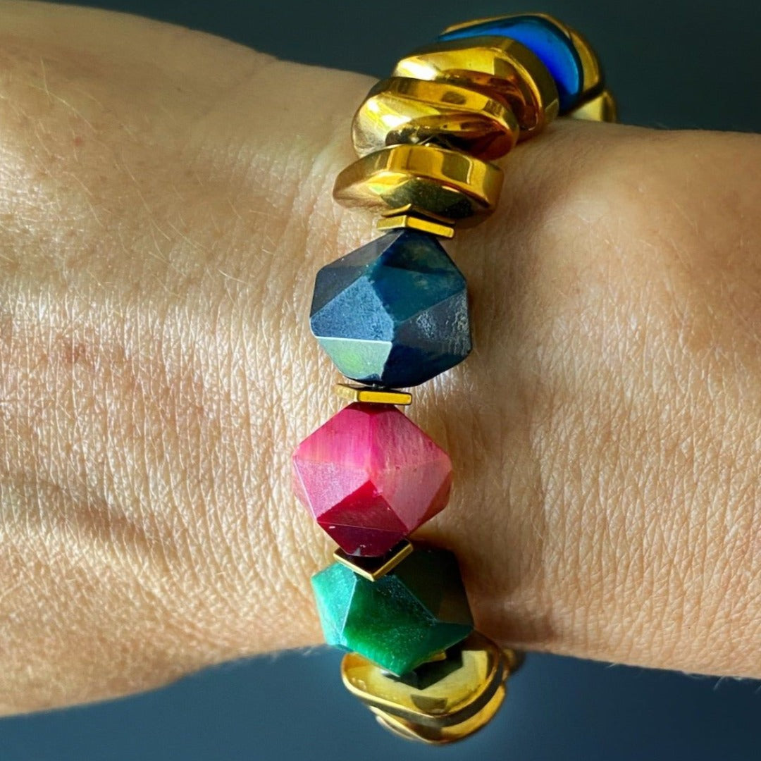 A model wearing the Karma Hematite Bracelet, showcasing how it adds a touch of elegance and positivity to any outfit.