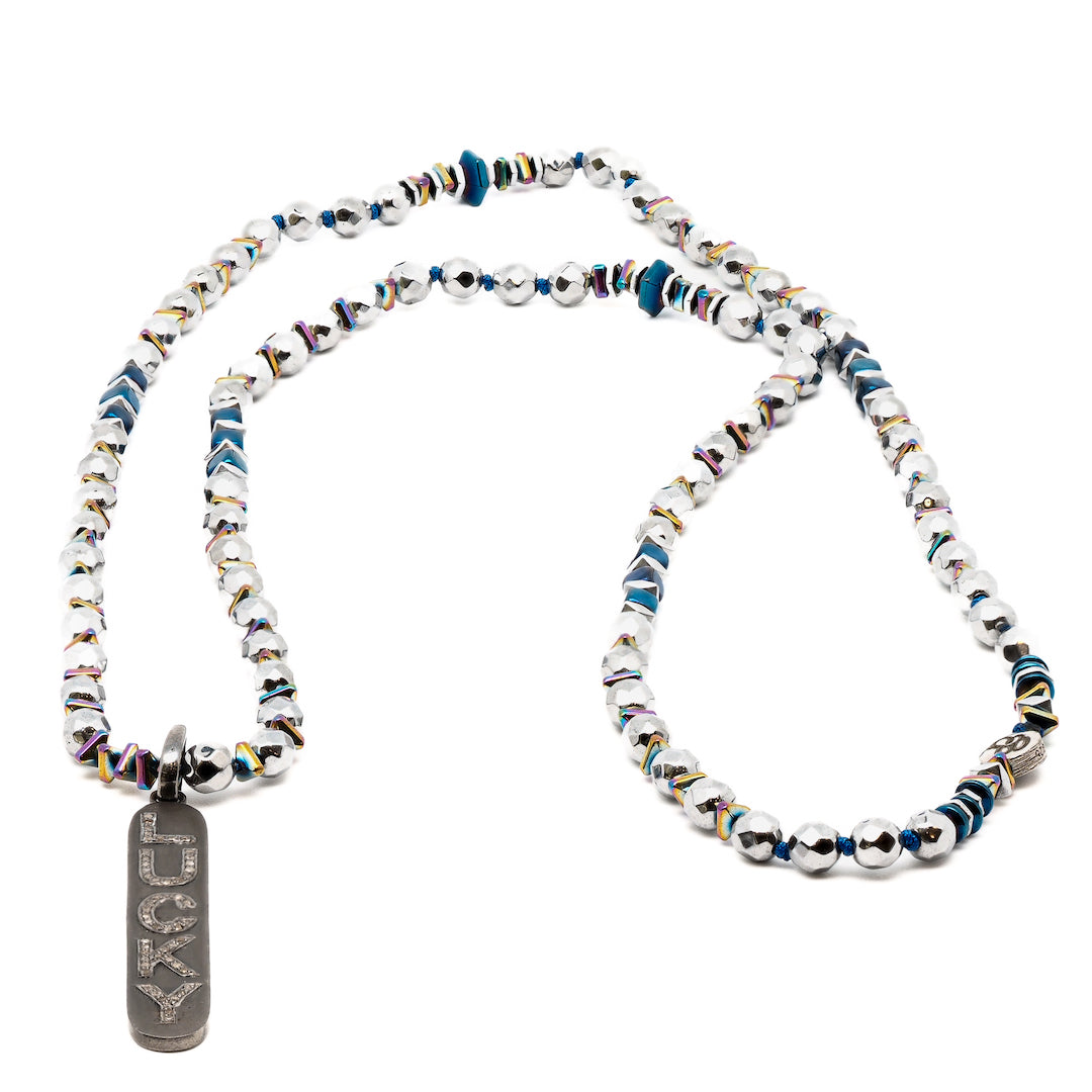 The Light of Luck Diamond Necklace, a bold and captivating piece that combines the power of hematite and the brilliance of diamonds.