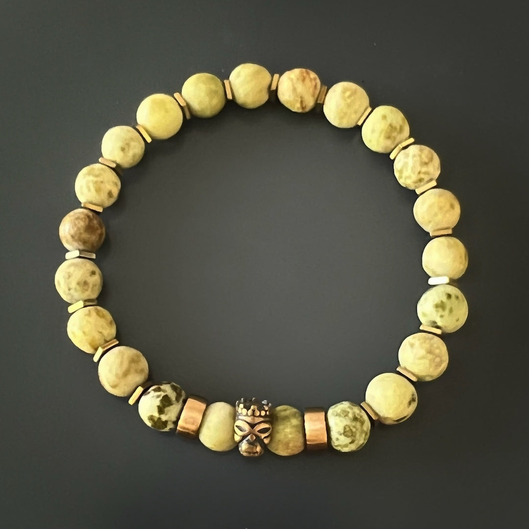 Matte Tree Agate stone beads and a bronze gold-plated Lion King accent bead come together in the Lion King Bracelet, evoking a sense of power and leadership.