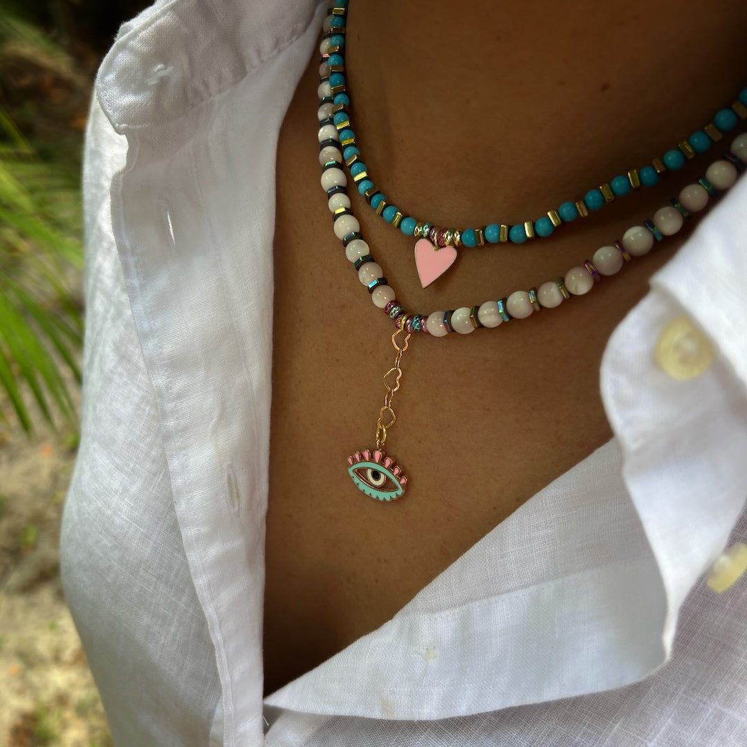 Experience the allure of the Love Protection Necklace on our model, a perfect blend of style and protection.