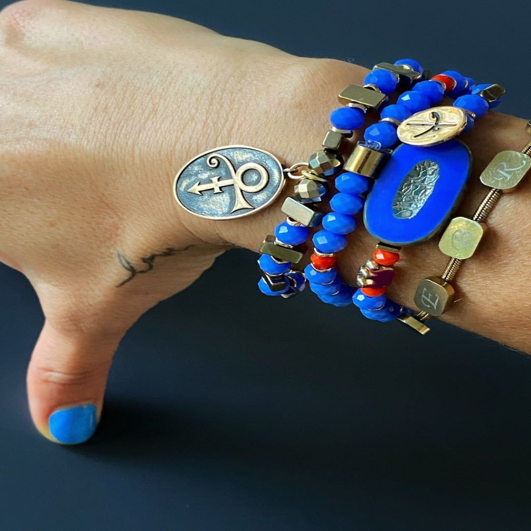 Model wearing the Magical Symbols Bracelet Set, radiating confidence and grace with this empowering accessory.