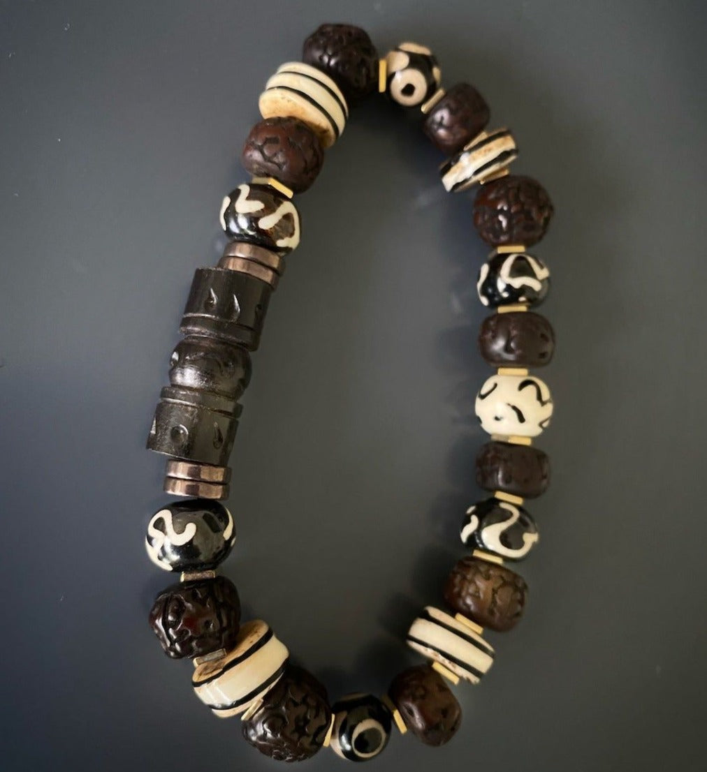 Immerse yourself in the sacred energy of the Meditation Yoga Bracelet, showcasing Nepal seed beads and hematite spacers.
