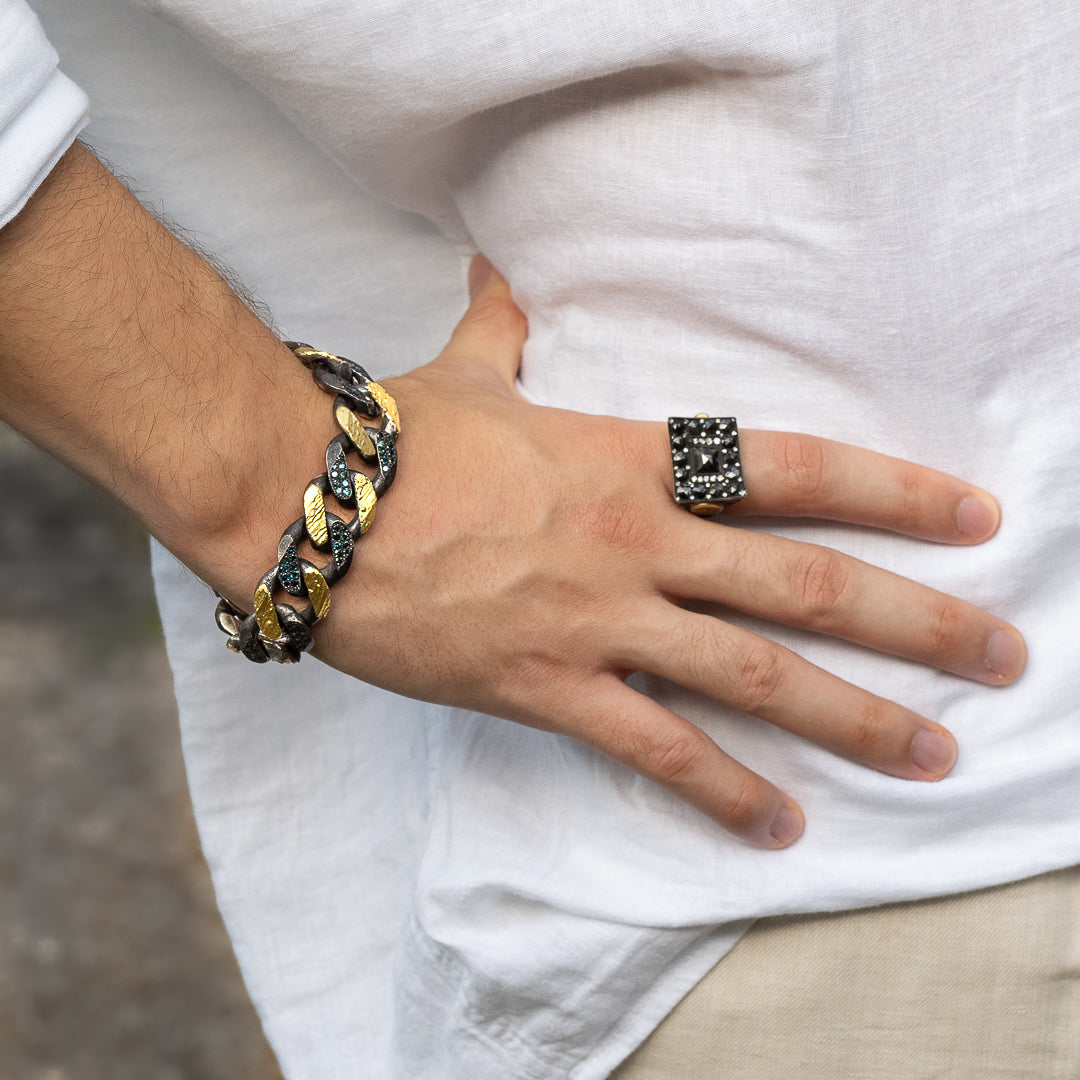 Model wearing the Nature Cuban Petroleum Bracelet, capturing the essence of elegance and luxury.