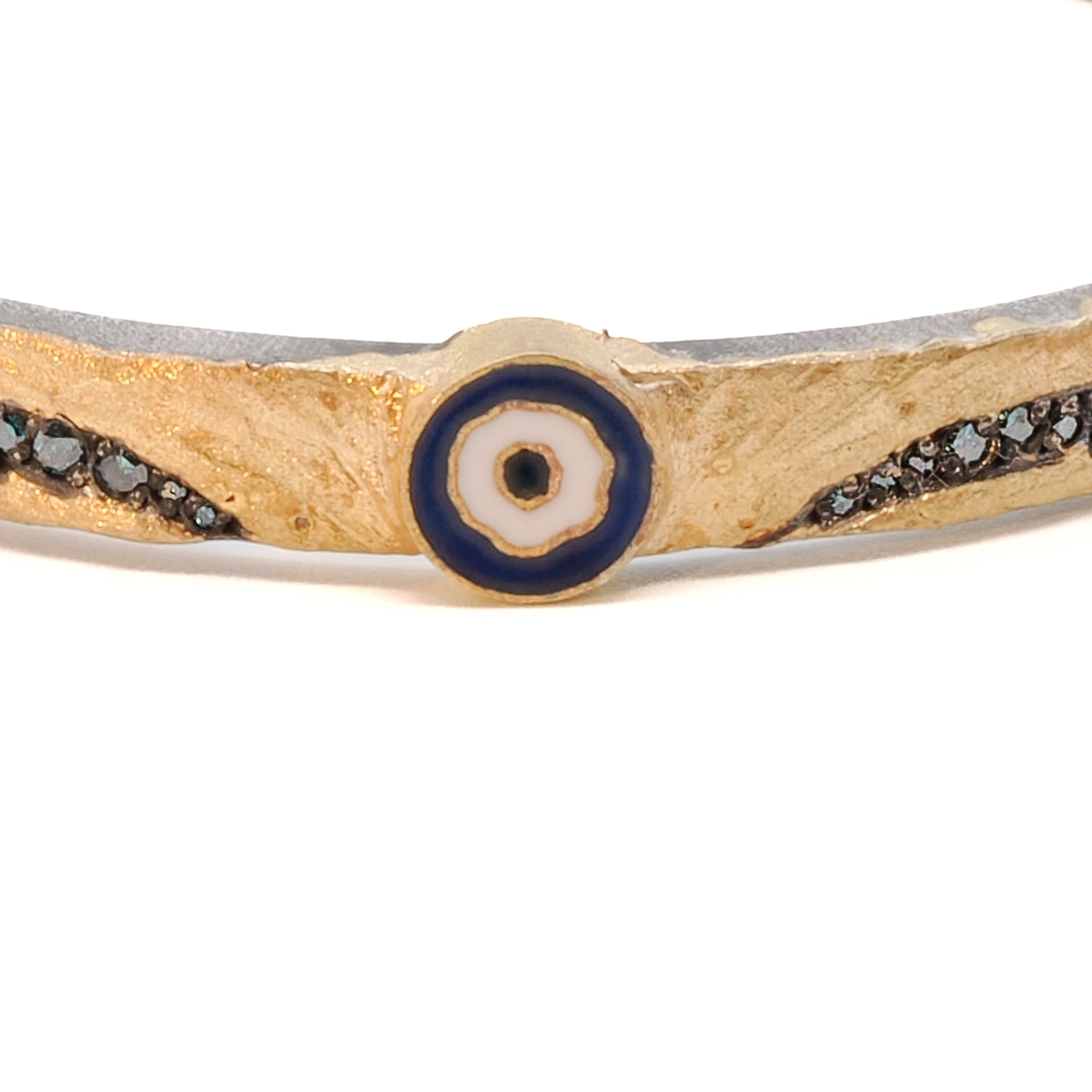 Nature Evil Eye Bangle Bracelet, a symbol of protection and style, meticulously handcrafted by Ebru Jewelry in their New York atelier.