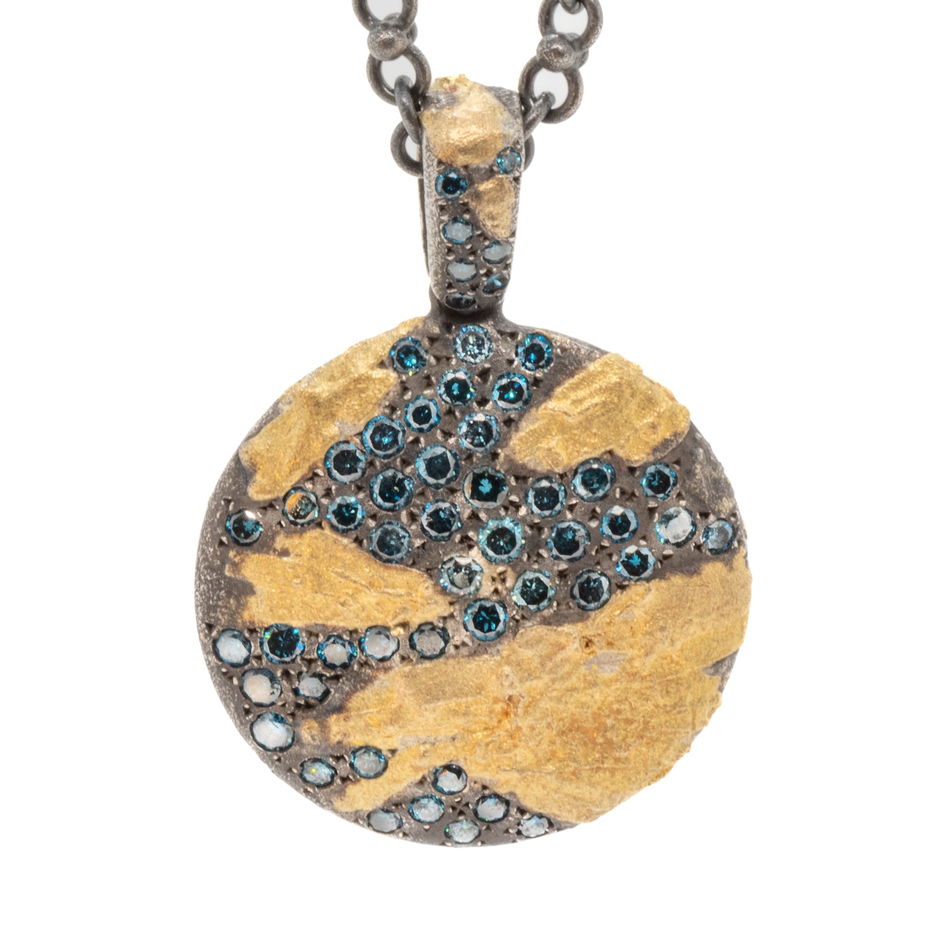 Detailed shot of the round pendant on the Nature Round Necklace, highlighting its luxurious and unique appeal.