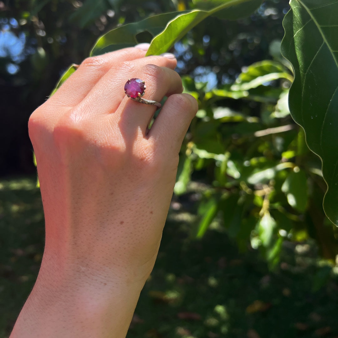 Passionate Brilliance - Model Wearing Ruby Engagement Ring with grace.