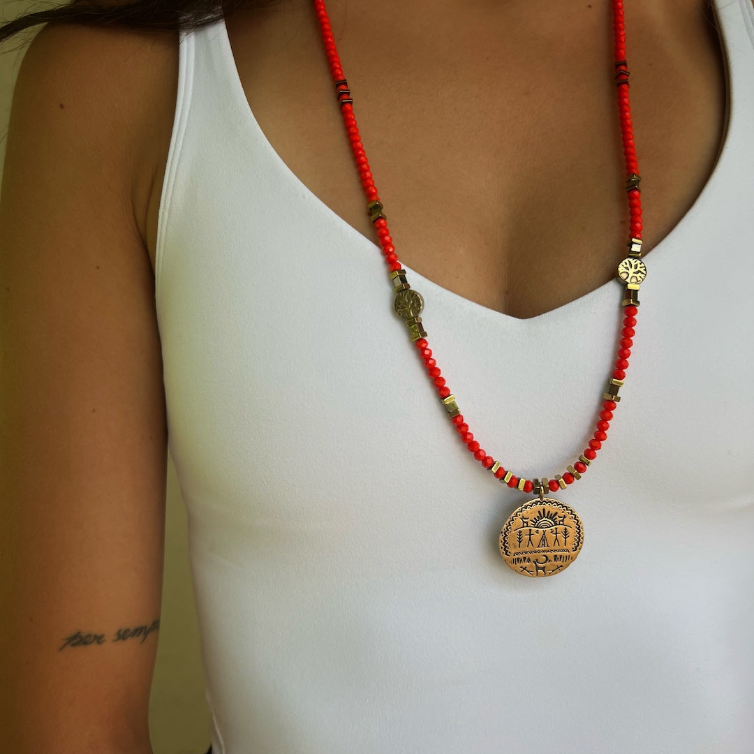 Model wearing the Shaman Talisman Necklace - Radiate the energy and protection of this unique handmade piece.