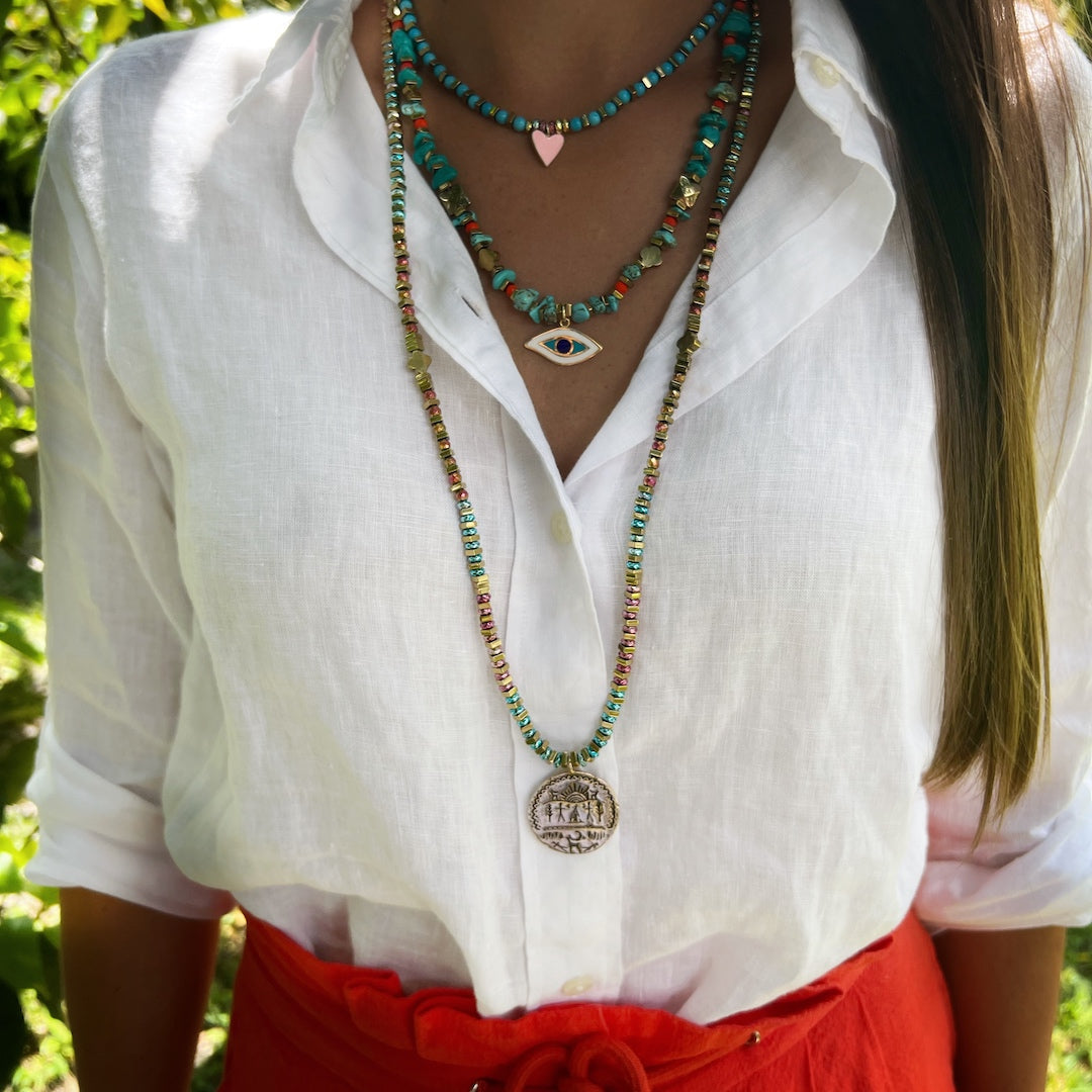 Enhance Your Style with the Mystical Shamanic Necklace - Modeled by our stunning model.