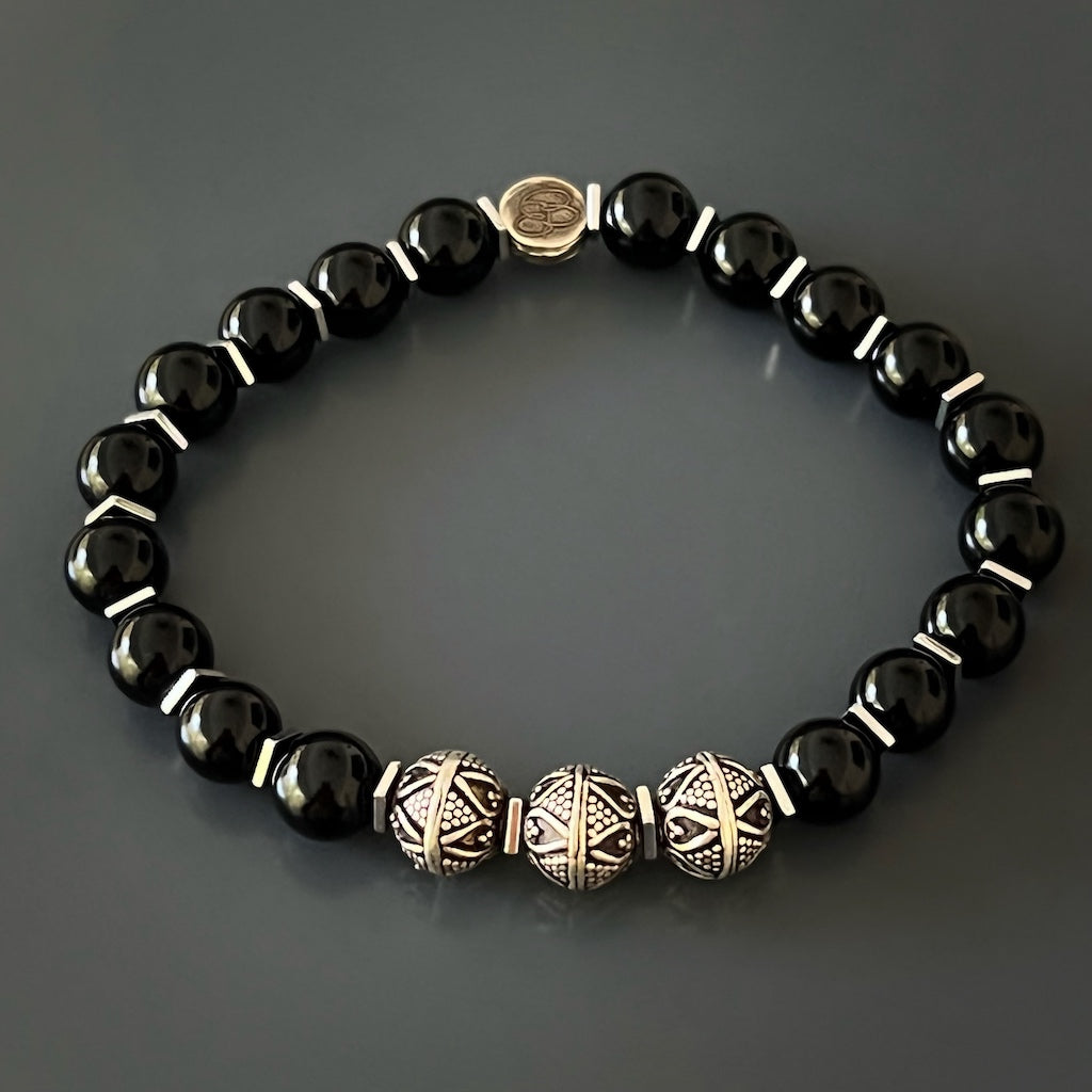 Standout Piece of Jewelry - Silver Tribal Bracelet.