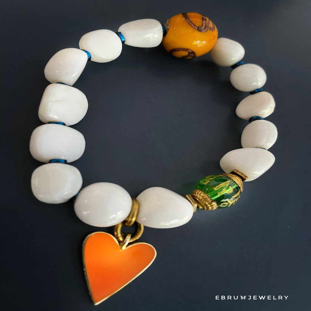 Let the Zen Bracelet Set guide you to a state of mindfulness and serenity, with its Tibetan White Stone Beads and intention-filled charms.