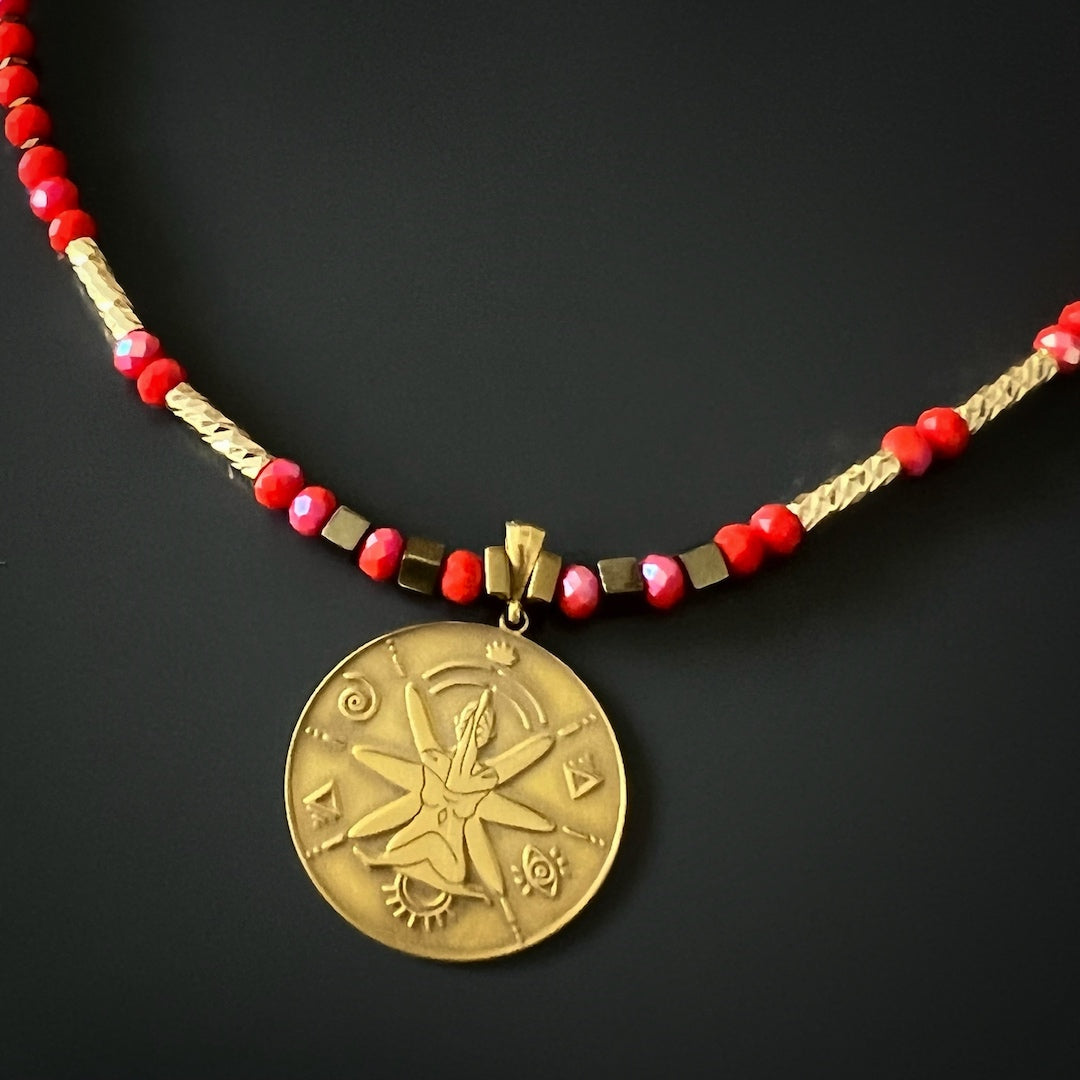 Necklace perfect for yoga lovers, adorned with gold hematite spacers and a symbolic charm.