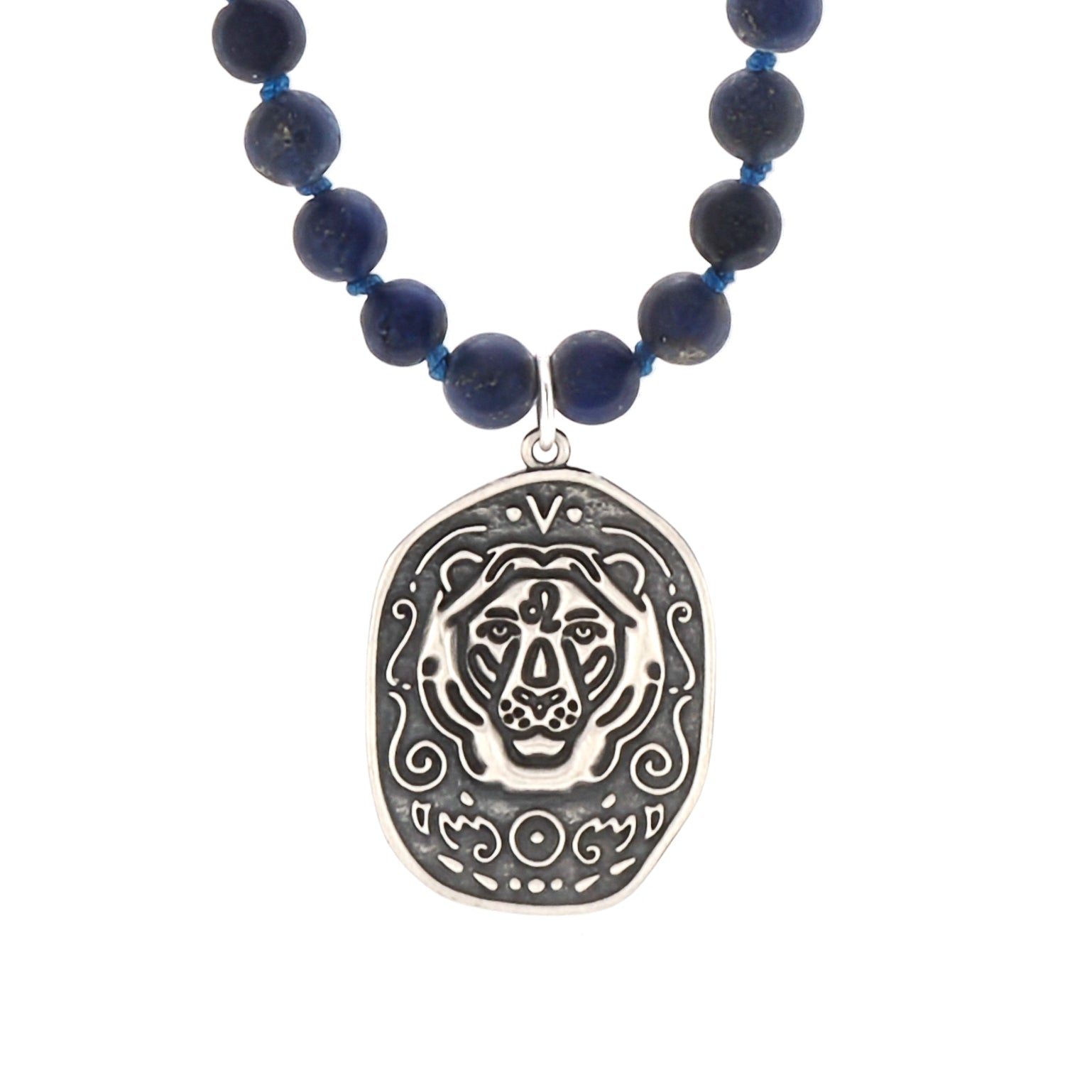 Embrace the power and elegance of the Spiritual Lapis Lazuli Lion necklace, featuring lapis lazuli beads and a sterling silver lion pendant.