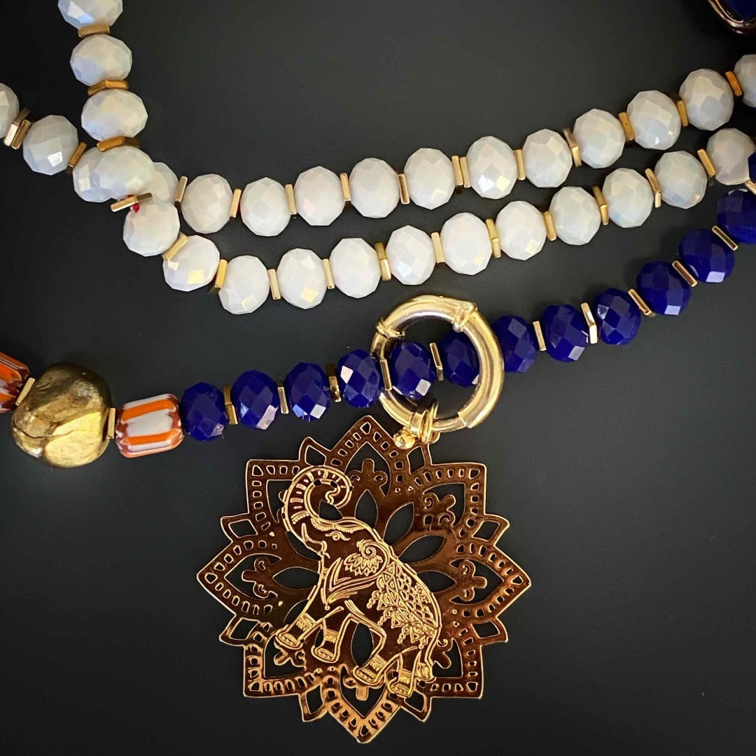 Discover the powerful symbolism of the Spiritual Elephant Necklace, featuring a lucky elephant pendant and a butterfly charm.