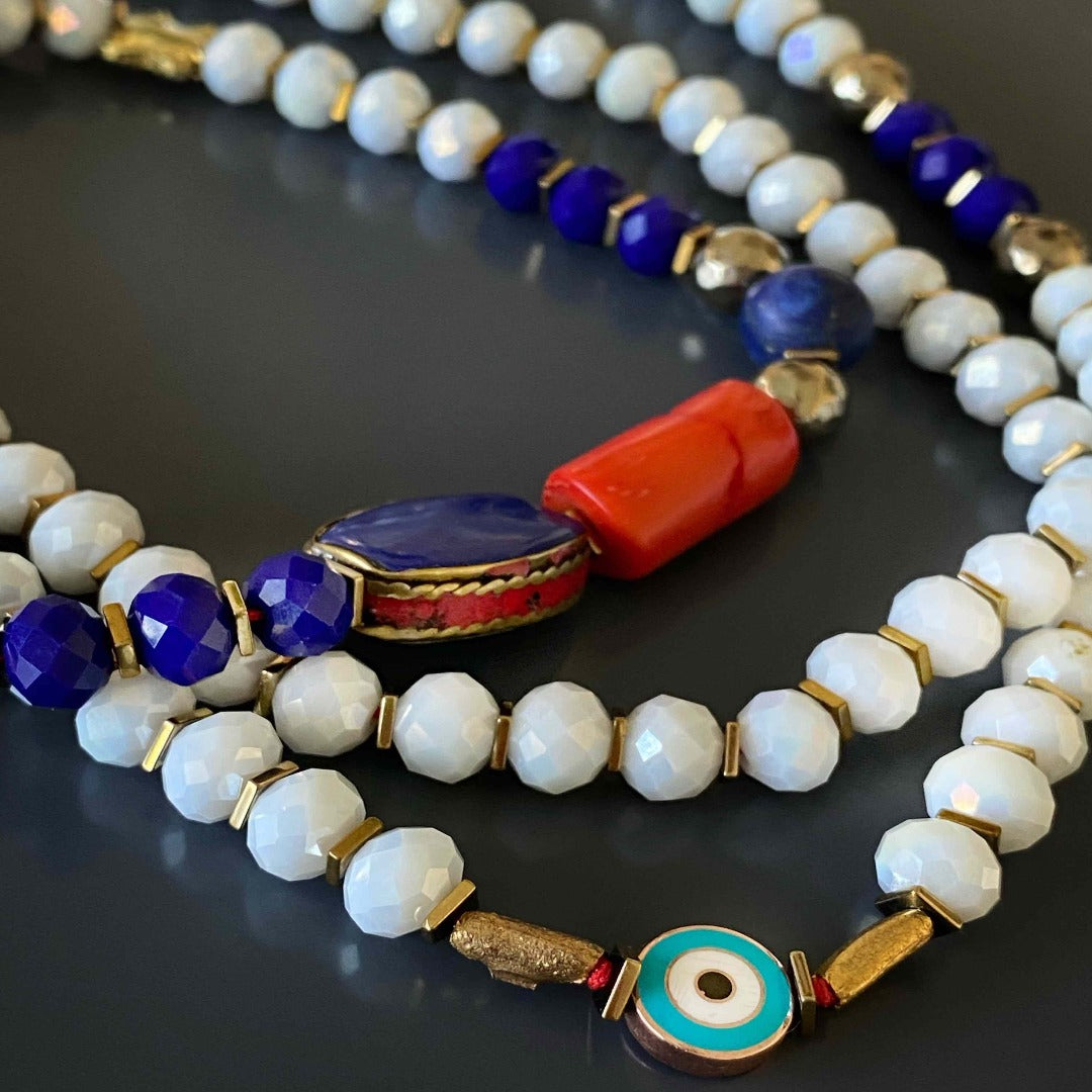 Experience the beauty and symbolism of the Spiritual Elephant Necklace, featuring a lucky elephant pendant and elegant crystal beads.