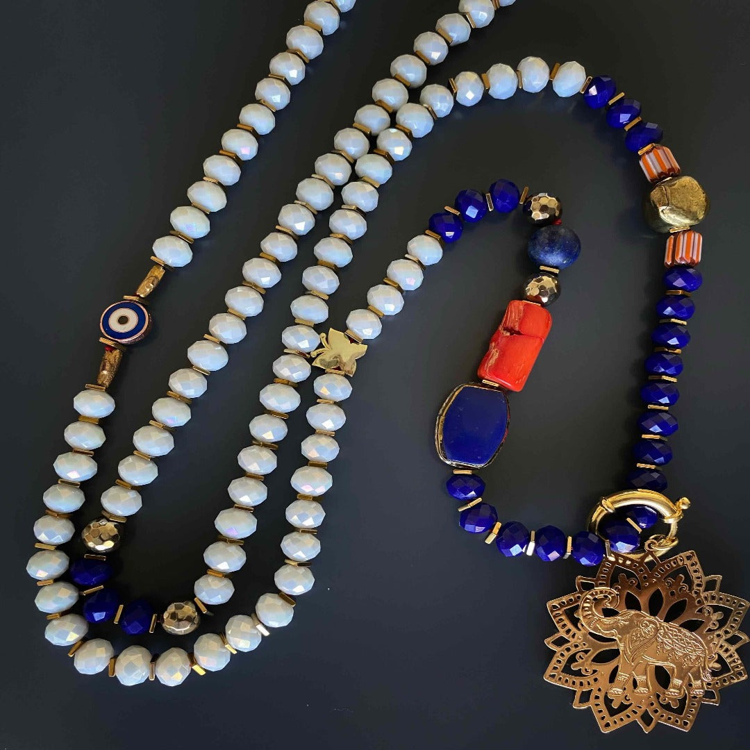 Handcrafted with care, the Spiritual Elephant Necklace is a symbol of good luck and protection, adorned with stylish crystal beads.