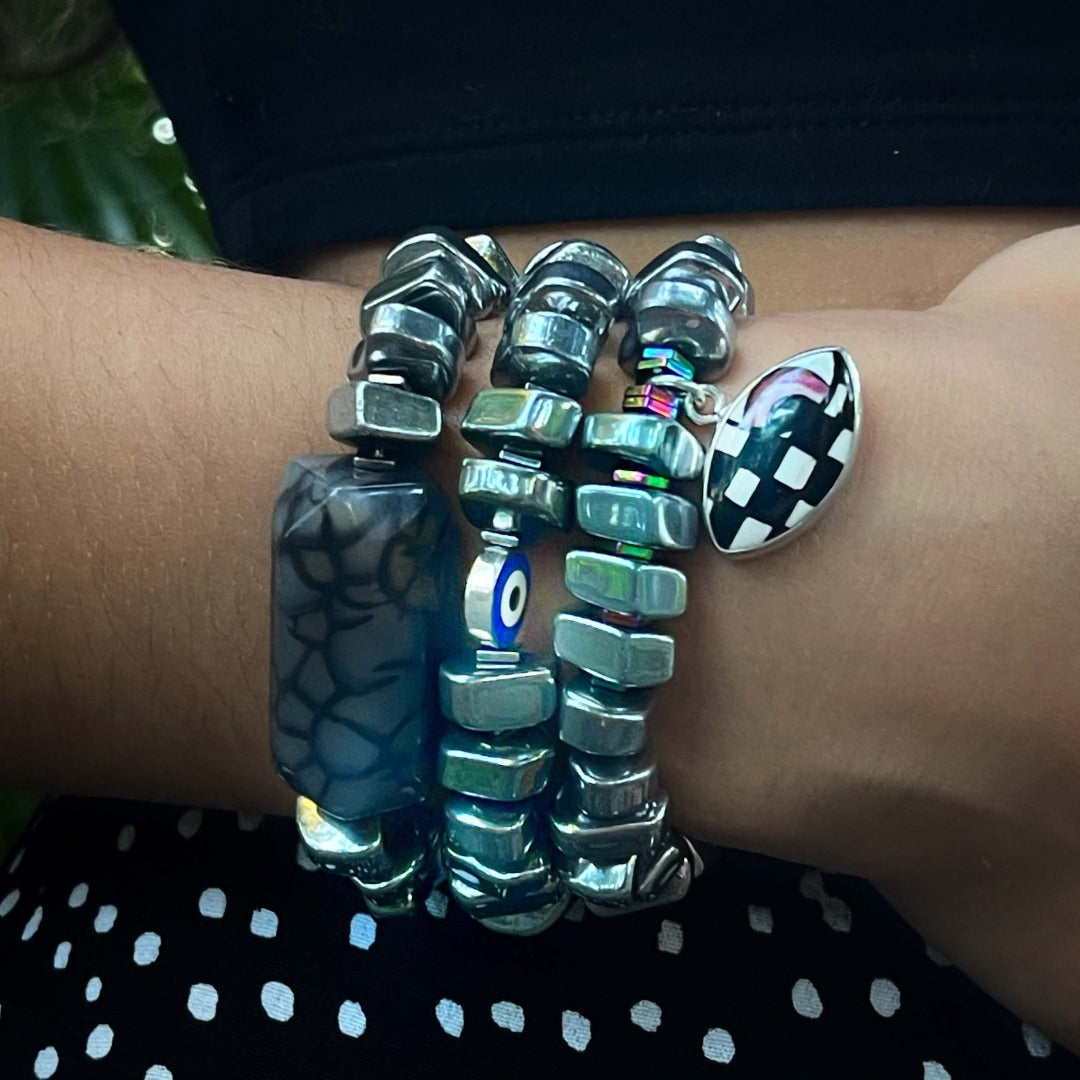 See how the Stylish Mila Bracelet adds a touch of sophistication to the model's ensemble