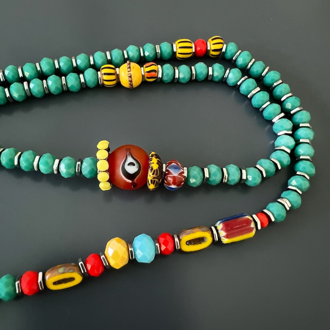 Embrace the positive vibes of the Summer Vibes Yogi Necklace's multicolored crystal beads.