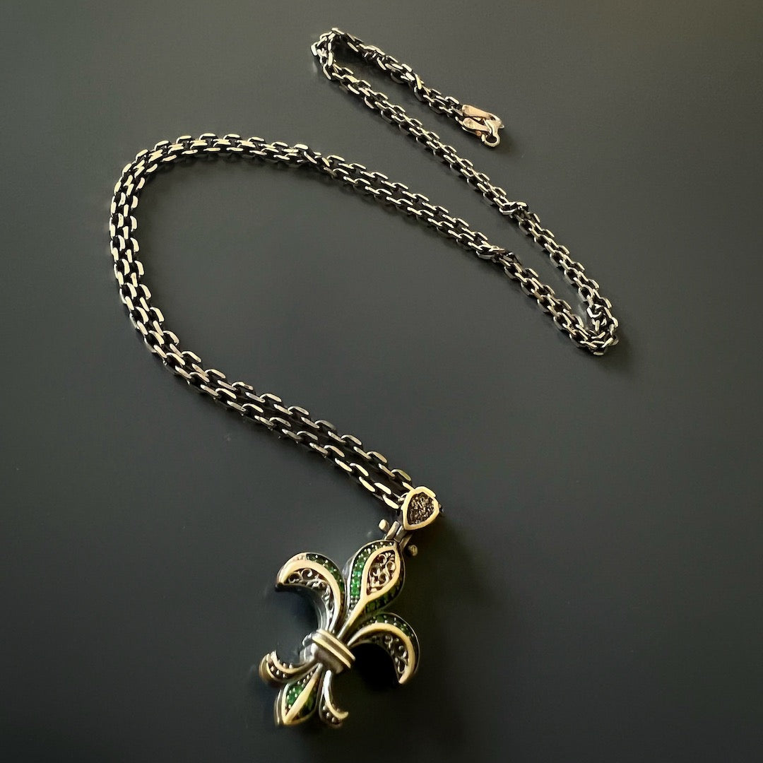 Elevate your style with the Unique Designer Fleur de Lis Necklace, a one-of-a-kind piece that exudes elegance and sophistication.