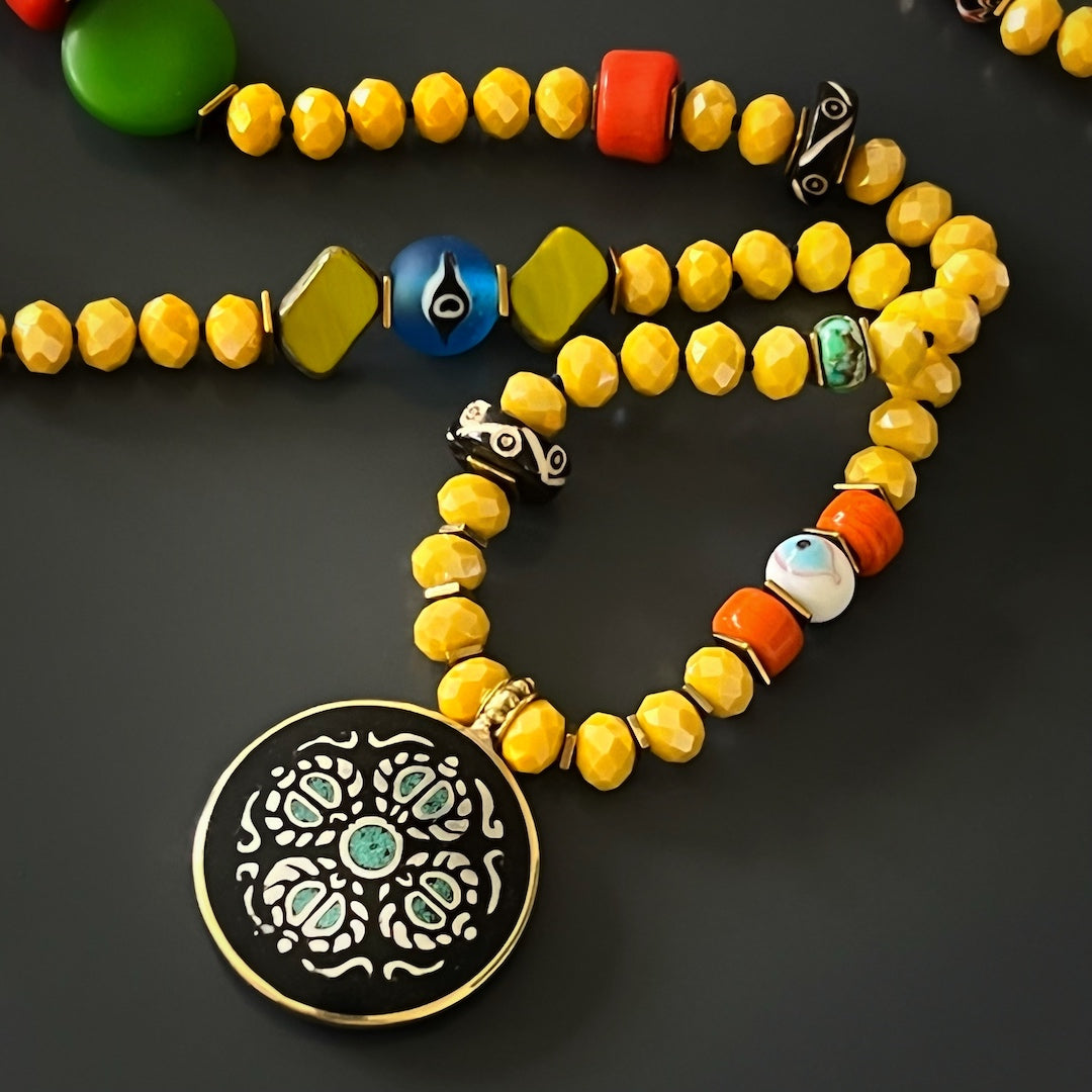Vibrant and unique, the Yoga Serenity Necklace is perfect for yoga and meditation enthusiasts.