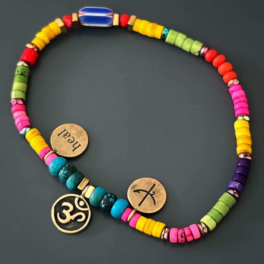 Handmade turquoise ankle bracelet with colorful howlite accents.