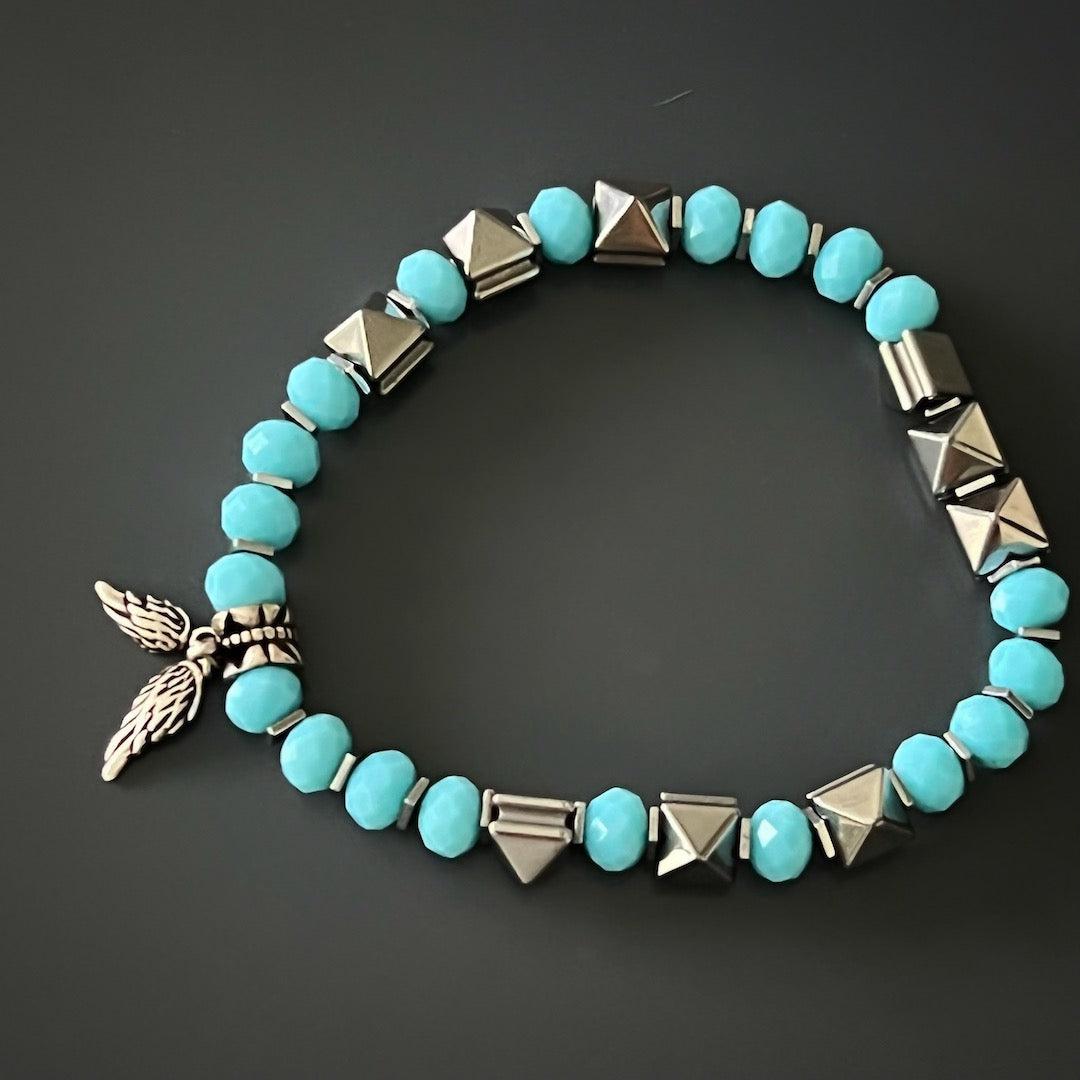 Bring a touch of spirituality and elegance to your look with the Angel Wings Anklet, a stunning handmade piece perfect for any occasion