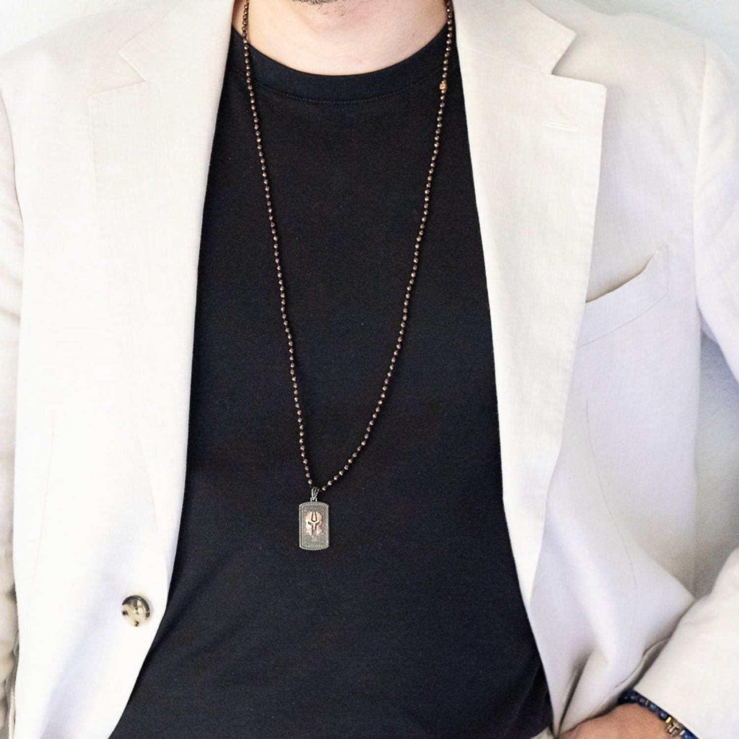 Model wearing the Brave Men Gladiator Necklace, showcasing its bold and stylish design.