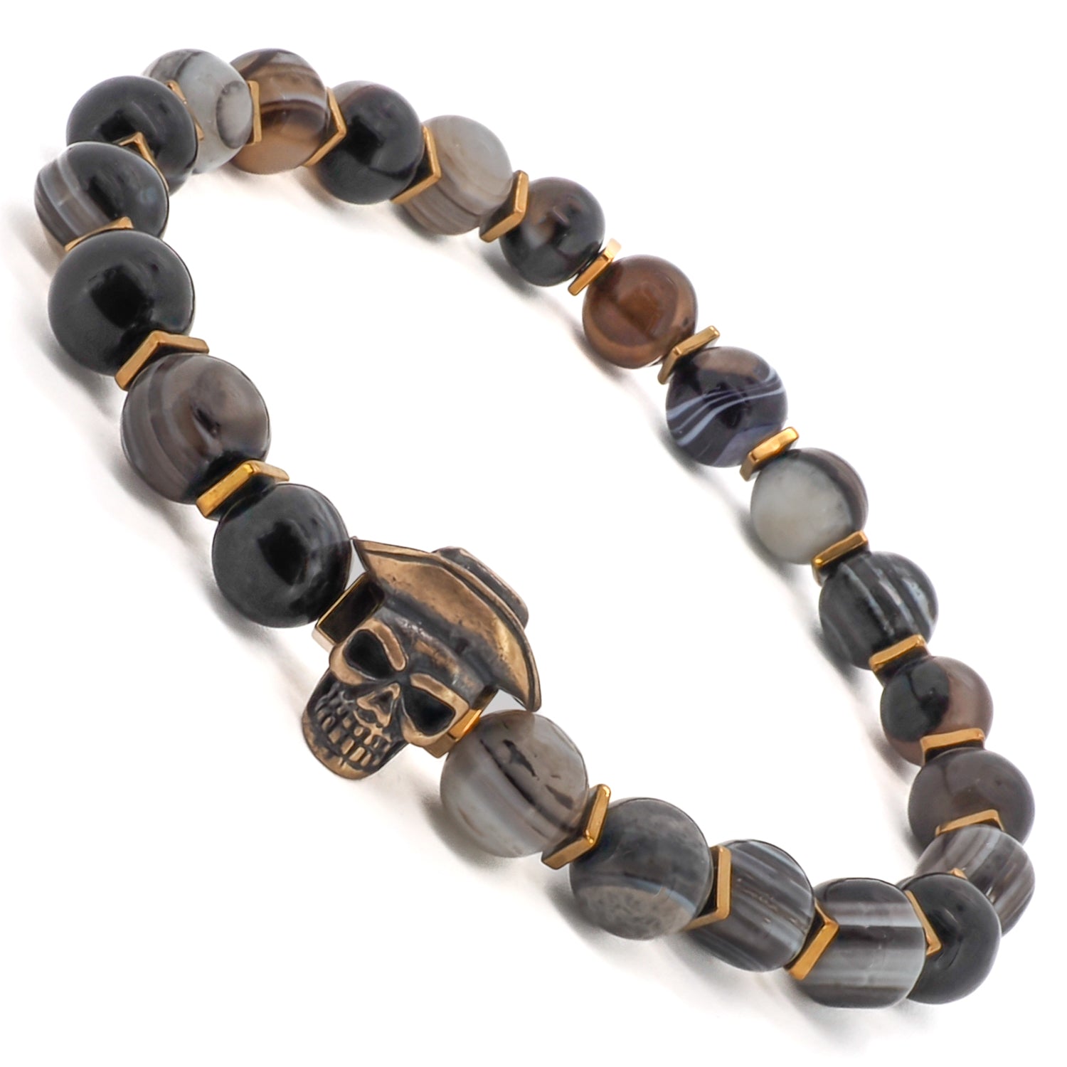 The Cowboy Hat Skull Agate Bracelet is a perfect choice for men who want to add an edgy touch to their style. Featuring Agate stone beads, gold hematite spacers, and a bronze cowboy hat skull charm, this handmade bracelet is a unique and eye-catching accessory.