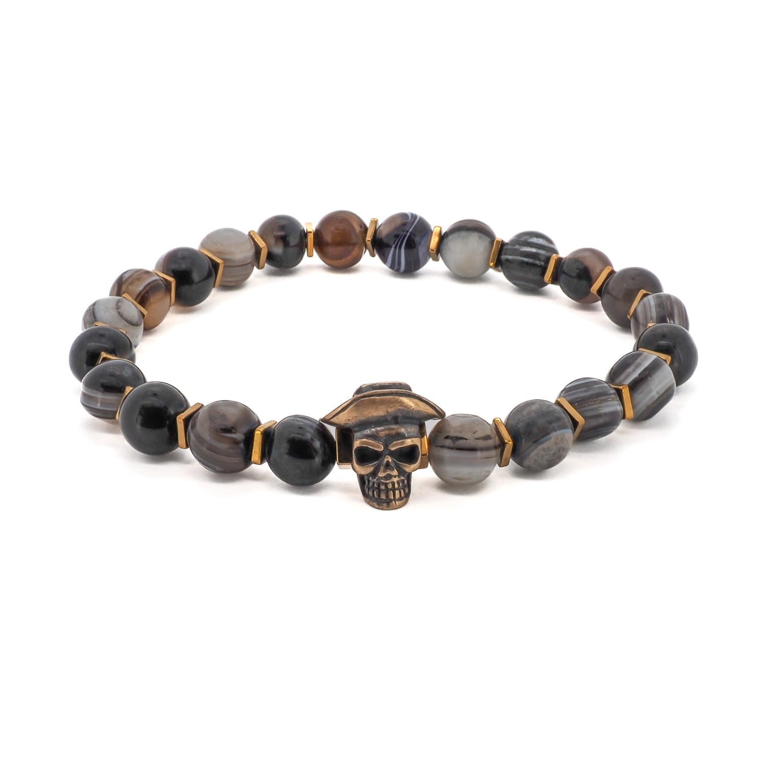 The Cowboy Hat Skull Agate Bracelet combines the natural beauty of Agate stone beads with a distinctive bronze cowboy hat skull charm. Handcrafted with attention to detail, this bracelet is a symbol of individuality and style.