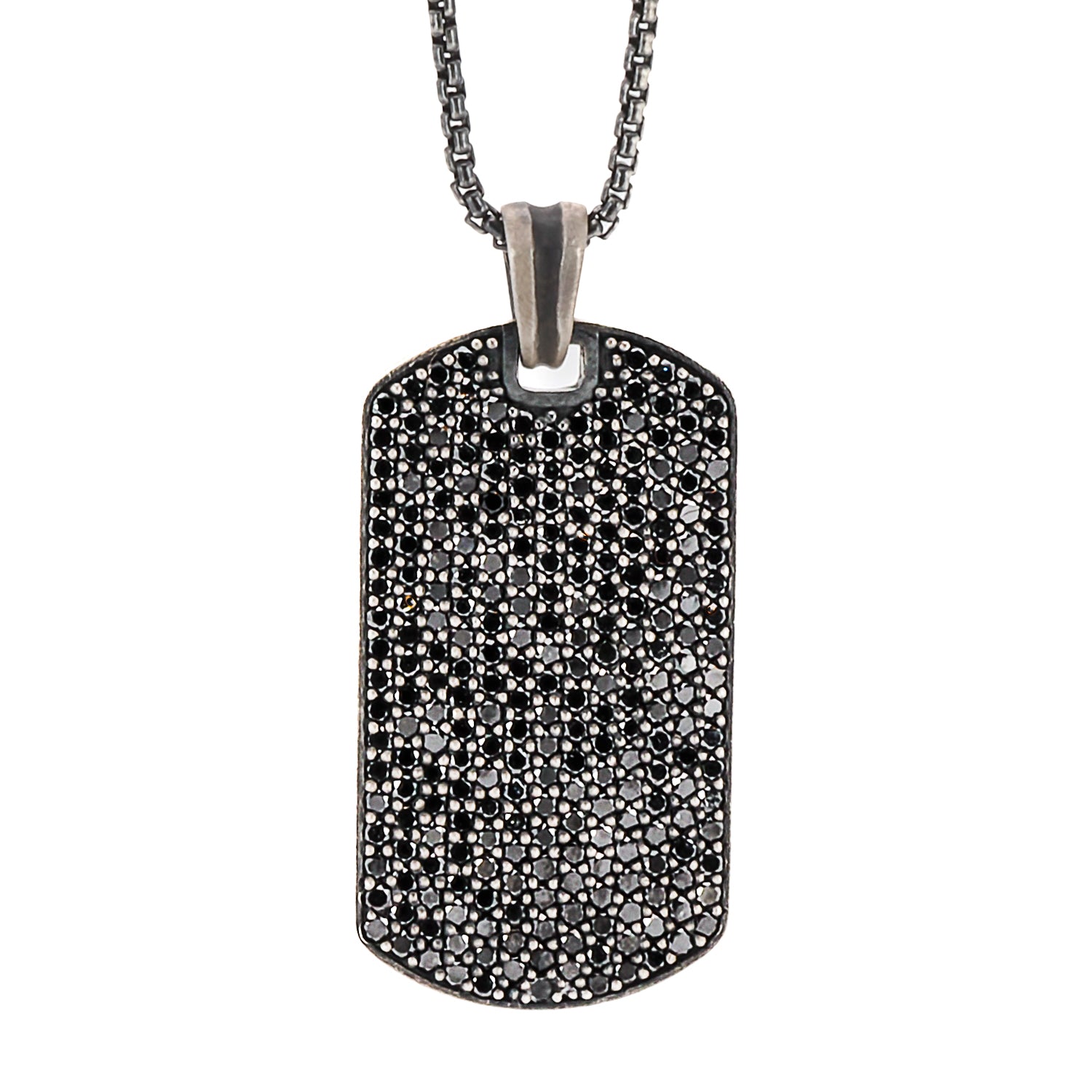 Detailed shot of the pendant on the Dog Tag Black Diamond Necklace, featuring the sparkling black diamonds that create a striking contrast against the sterling silver.
