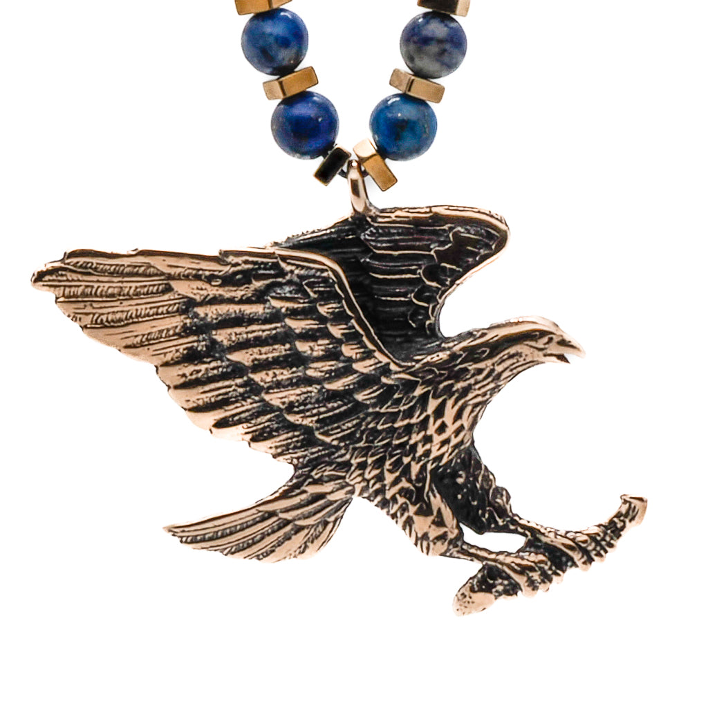 Eagle Spirit Necklace featuring a hand-engraved gold plated bronze pendant, perfect for expressing your freedom.