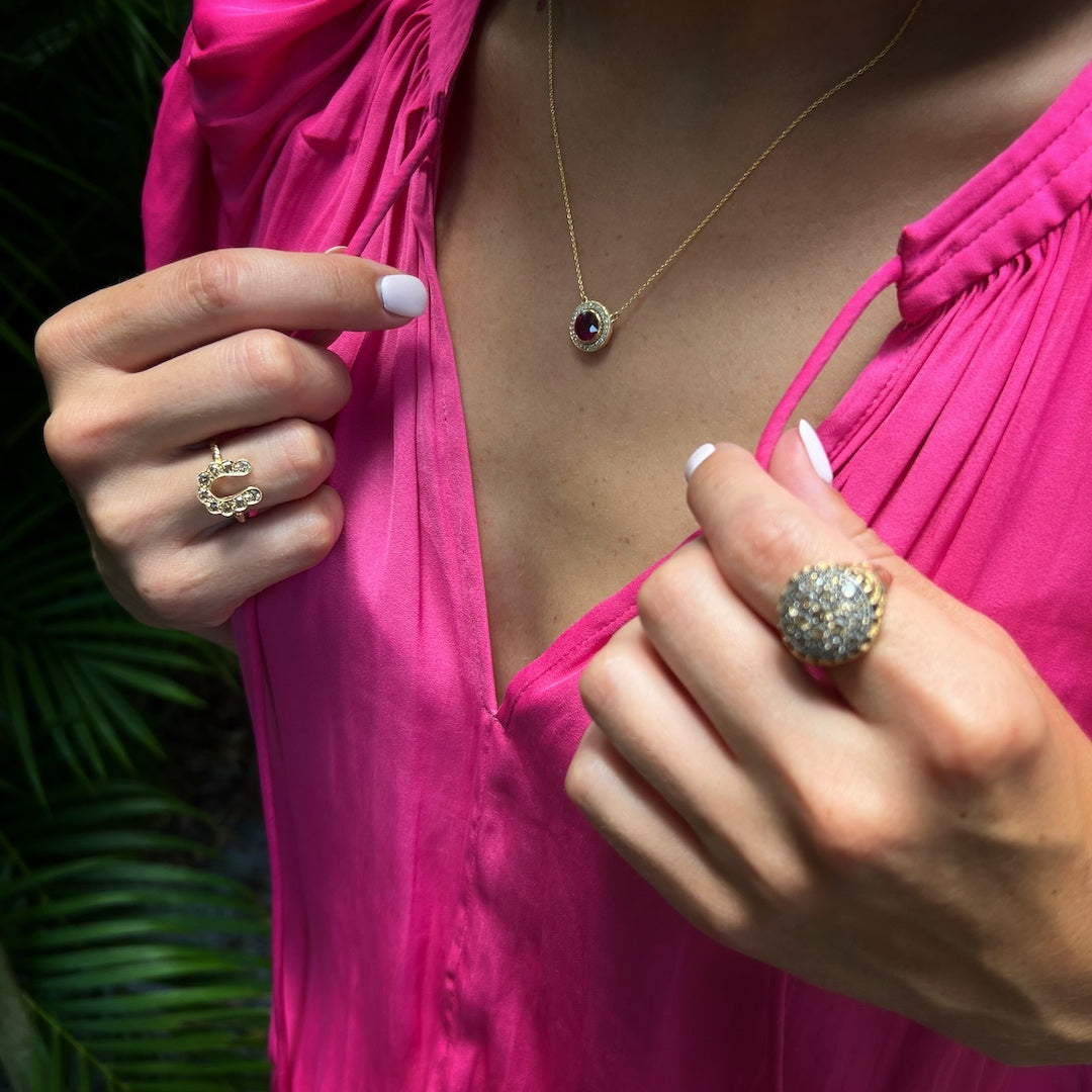 Close-up of a hand model gracefully wearing the Elegant Handcrafted Gold and Diamond Ring, capturing the essence of luxury and timeless beauty.