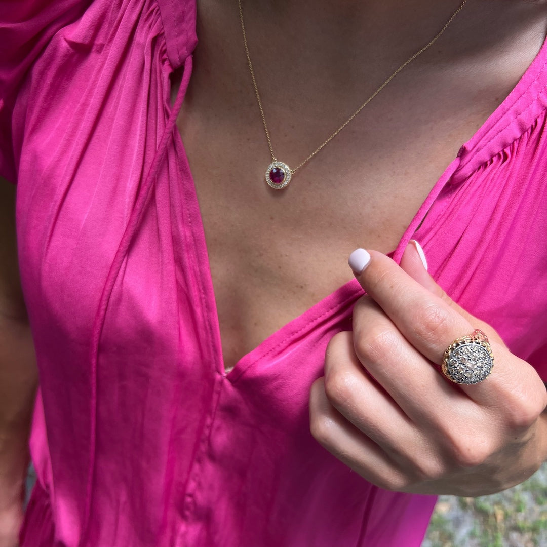 A hand model wearing the Elegant Handcrafted Gold and Diamond Ring, displaying the craftsmanship and attention to detail.