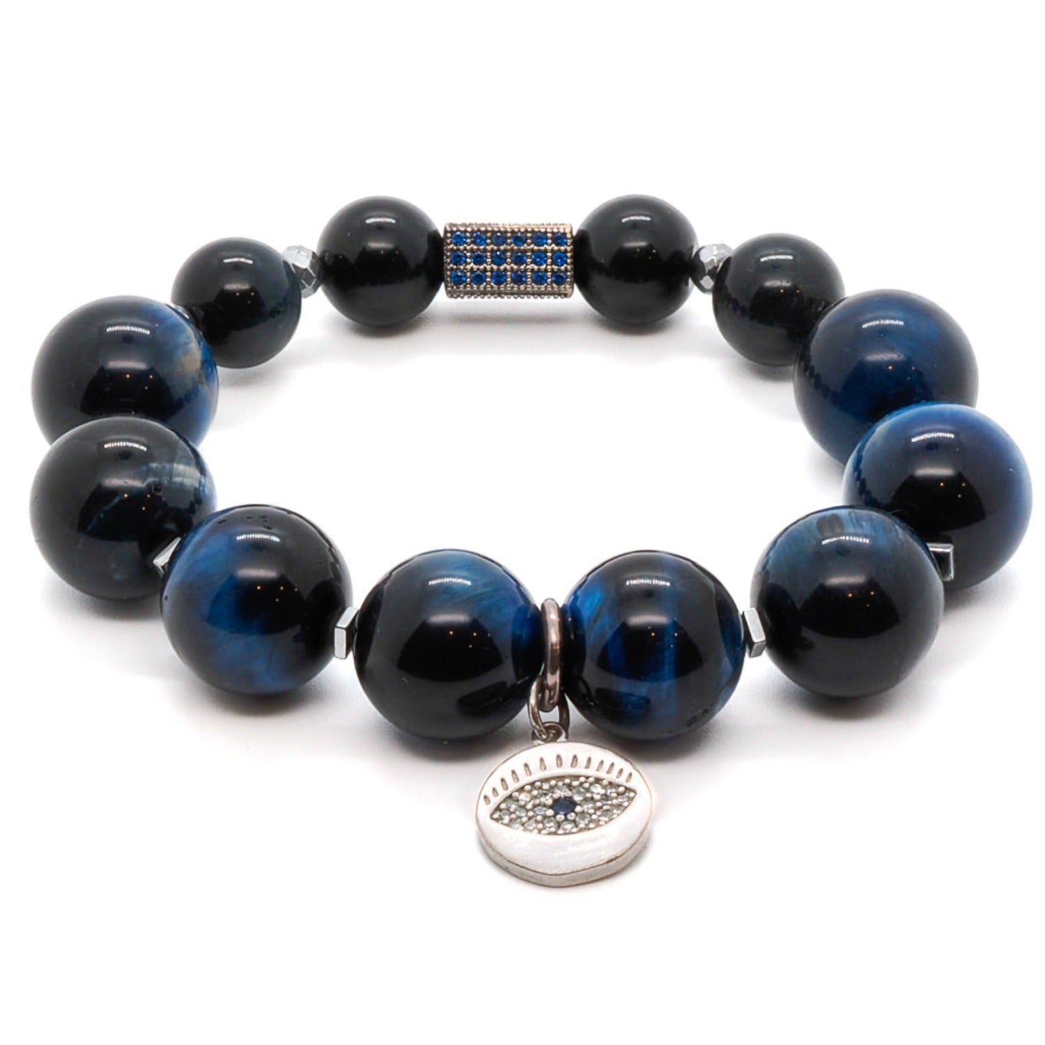 Experience the power and beauty of the Power Of Eye Bracelet, a handmade accessory adorned with Blue Tiger's Eye stone beads and a sterling silver evil eye charm.