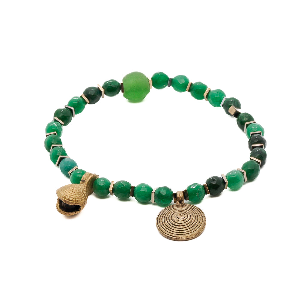 Handmade anklet featuring 7mm green jade beads, bronze Nepal spiral charm, and bronze Nepal bell charm, radiating spiritual energy and inner harmony.
