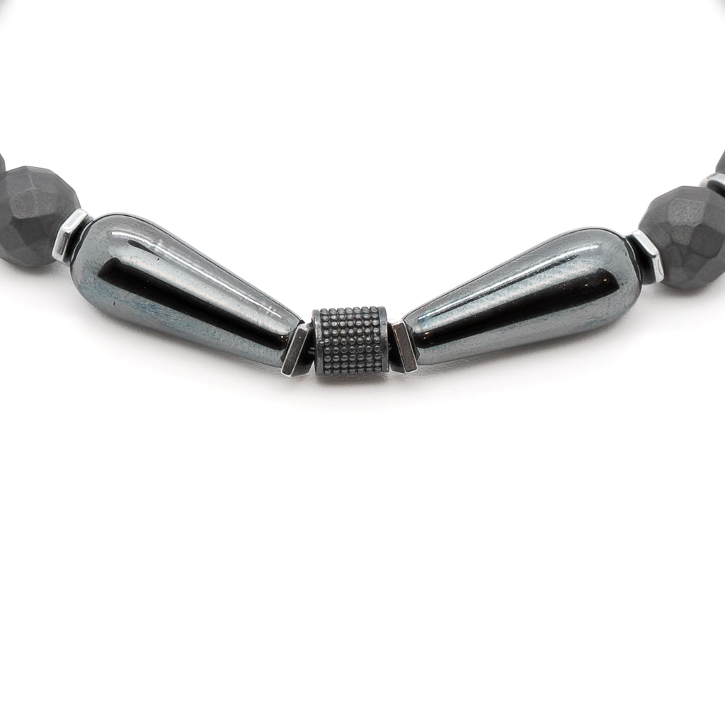 Close-up of the intricate details of the Hematite Balance Men's Bracelet, showcasing the natural hematite beads and silver accents.