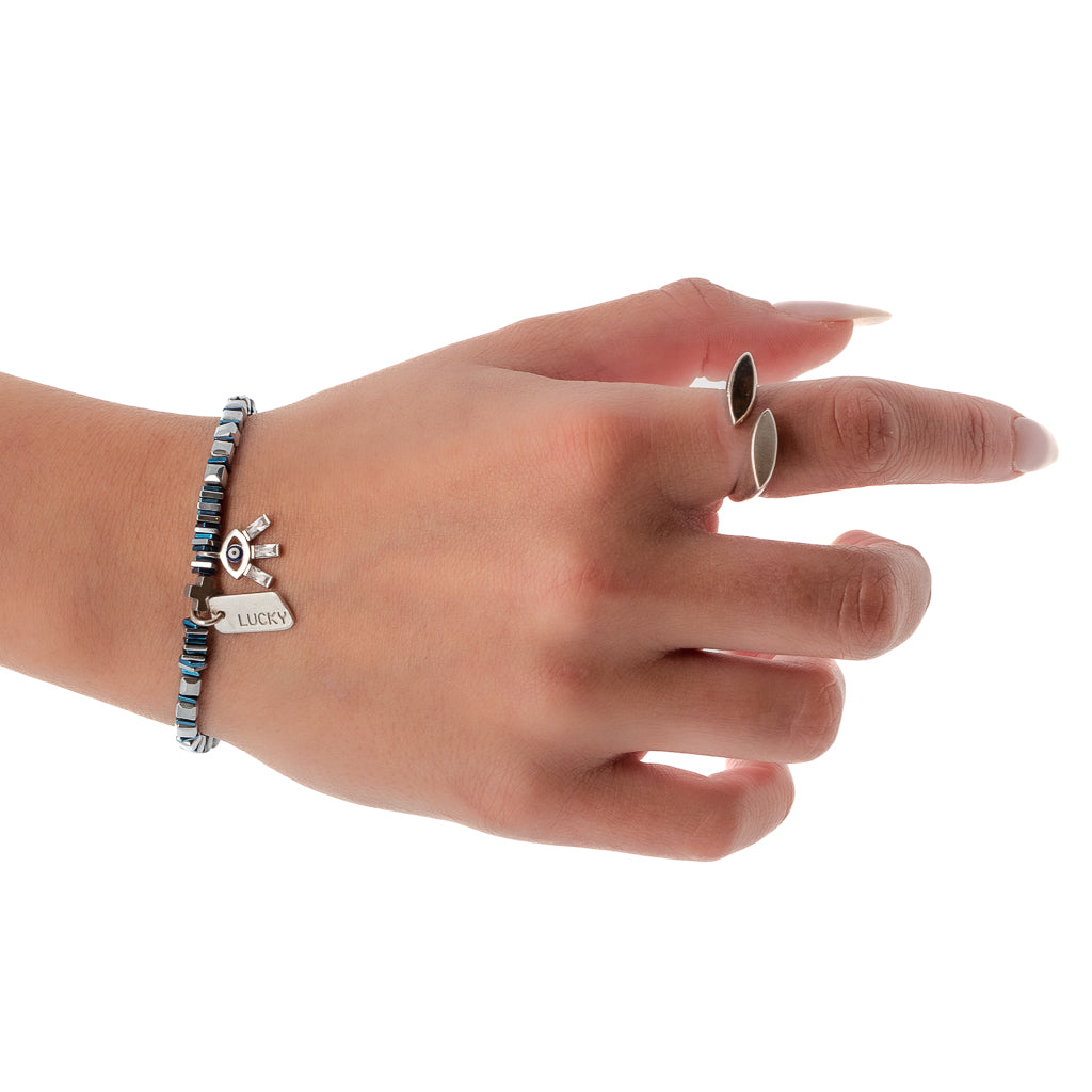 Witness the stylish elegance of the Lucy Evil Eye Bracelet, gracefully showcased by our model.